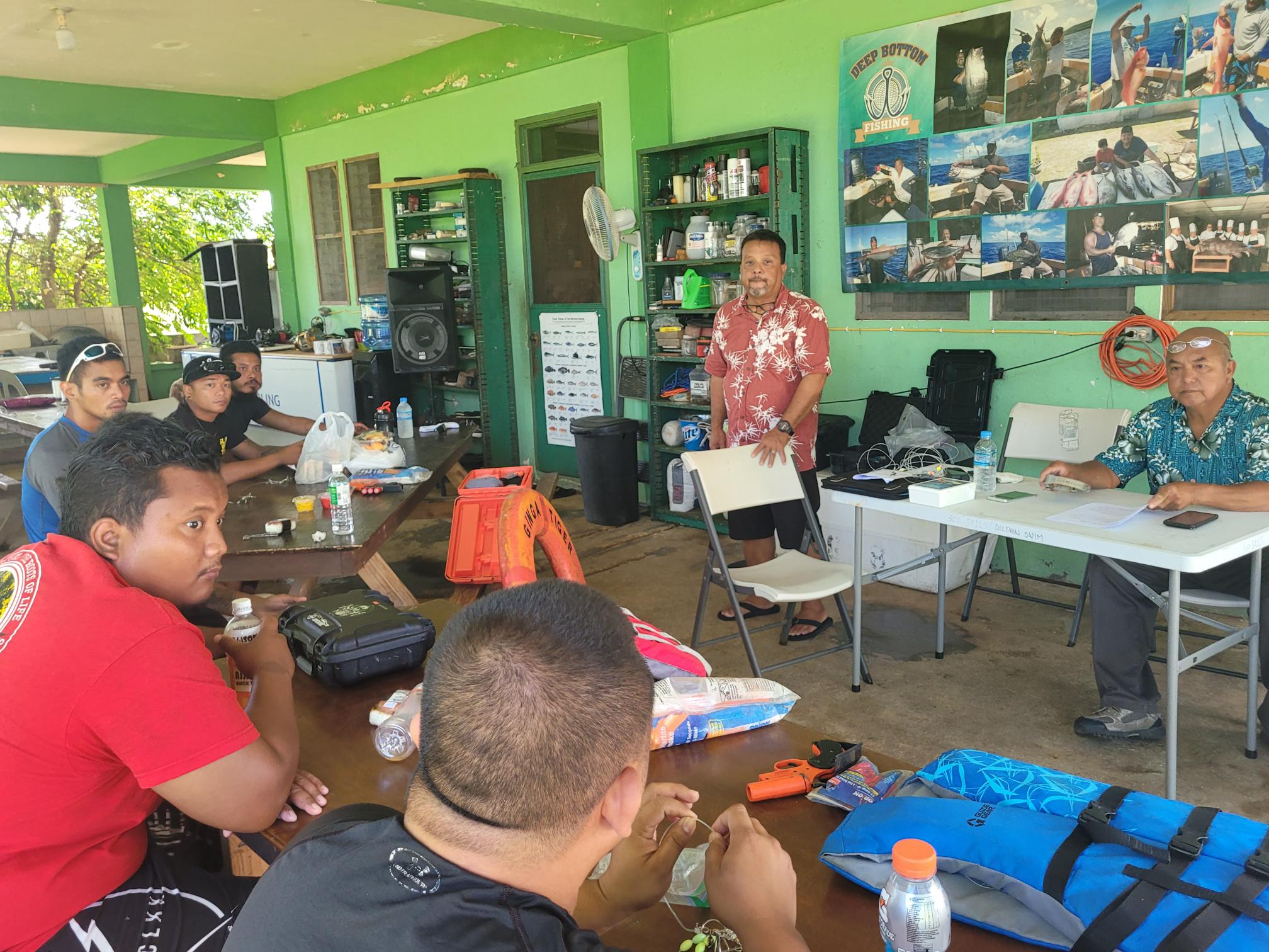 Lino Tenorio and Anthony Guerrero conduct a bottom-fishing workshop in Dandan on Friday.