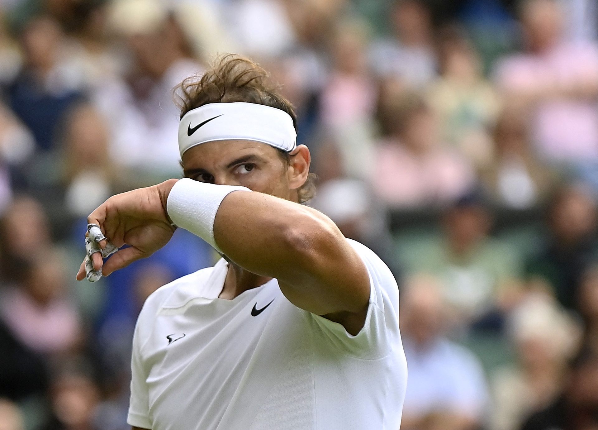 Spain's Rafael Nadal reacts during his first round match against Argentina's Francisco Cerundolo at Wimbledon in London, Britain on June 28, 2022.