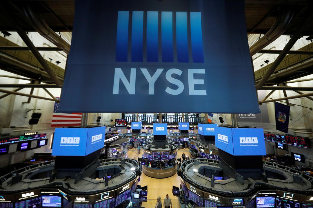 Signage hangs over the trading floor at the New York Stock Exchange in Manhattan, Aug. 19, 2021.