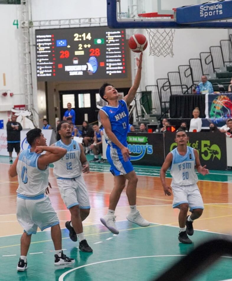 NMI Men's Coby Santos rises up for the finish during a game against the FSM in the FIBA Micronesian Basketball Cup 2022 on Guam.