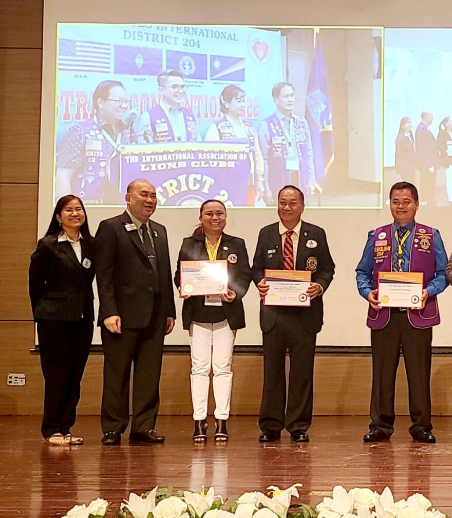 Lions Global Action Team AwardsPast Council Chairman George Ong-Tan, Global Action Team Area 5 leader for MD301 Philippines and D204 Guam, presents  a certificate of appreciation to honor  Lion Annamae Adaza-Mayuga, district global service team coordinator, for her service to the community while Lion President Marcelo Masilungan, district IT chairperson, receives a certificate and a GAT Chairman's Medal to recognize him as a Lion who exemplifies the best of the GAT at the international level.  The presentation was held during the District 204 Convention on May 15 at the World Resort Saipan. From left are Lion Lady Rosita Lim Ong-Tan, George Ong-Tan, Mayuga, District Governor Atoy Banting and Masilungan.