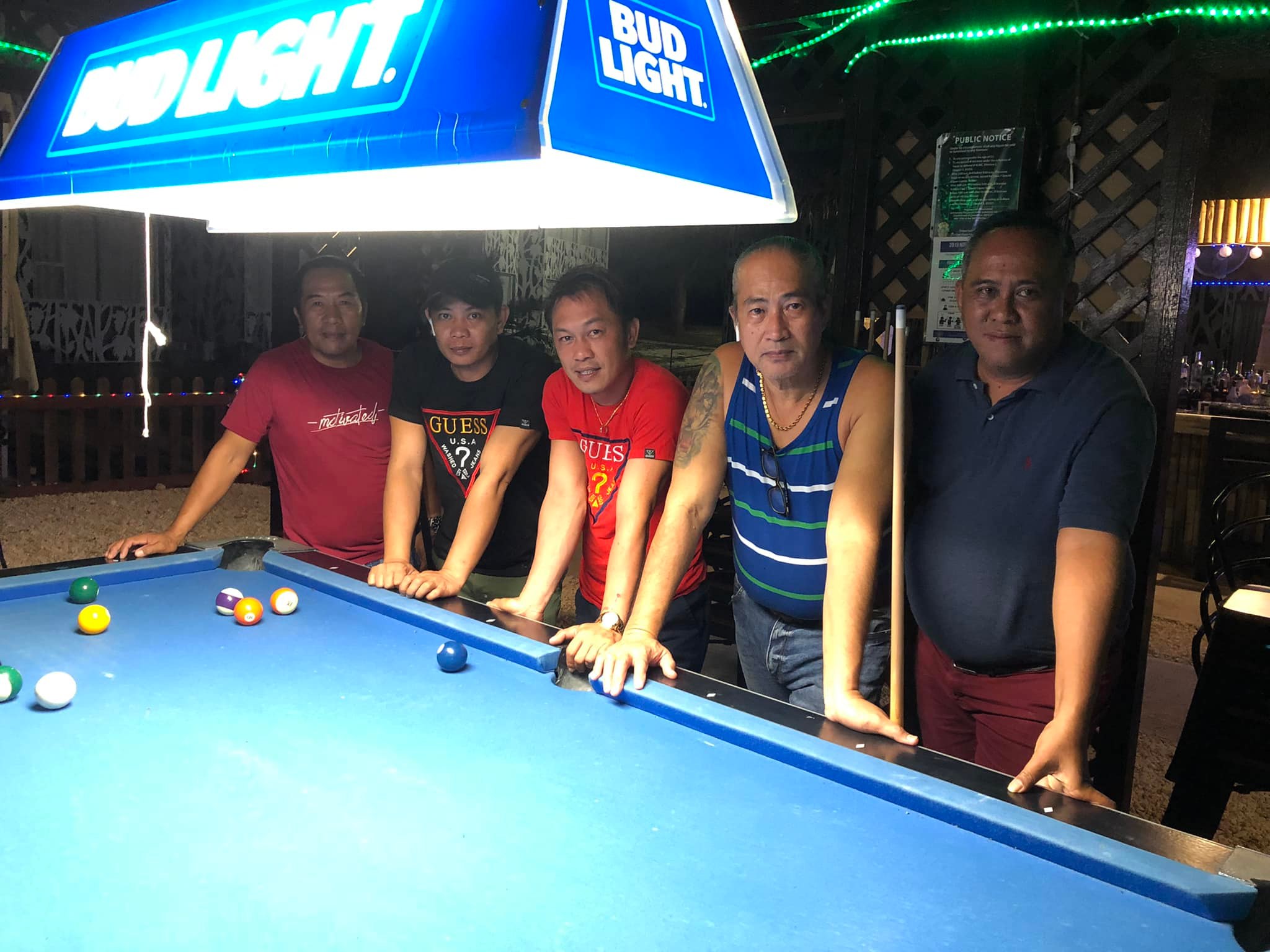 Bamboo NSA Kabalen team members pose for a photo after playing a Tuesday Division match in the SBA Budweiser Open 8-Ball League at the New Bamboo Bar of Saipan Vegas.