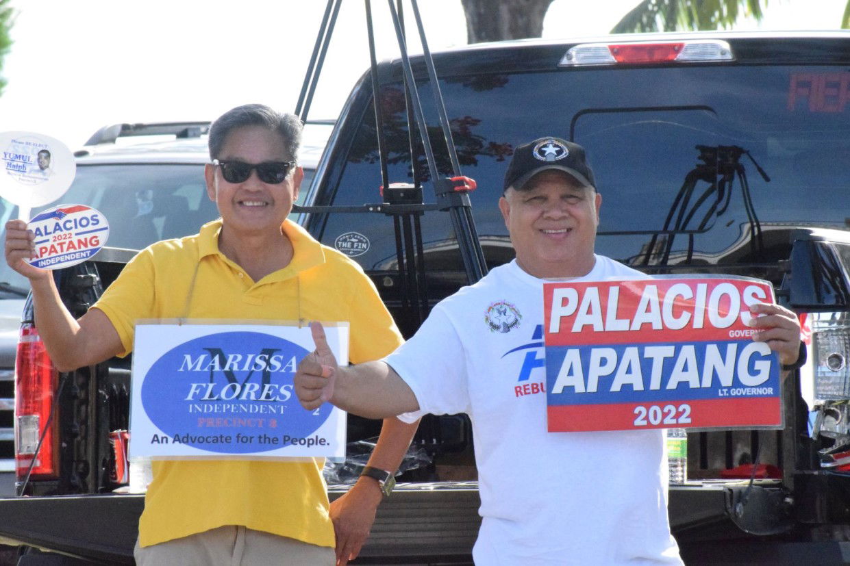 Customs Director Jose Mafnas, right, with former Department of Public Works Technical Services Division staff member Danny Buniag.