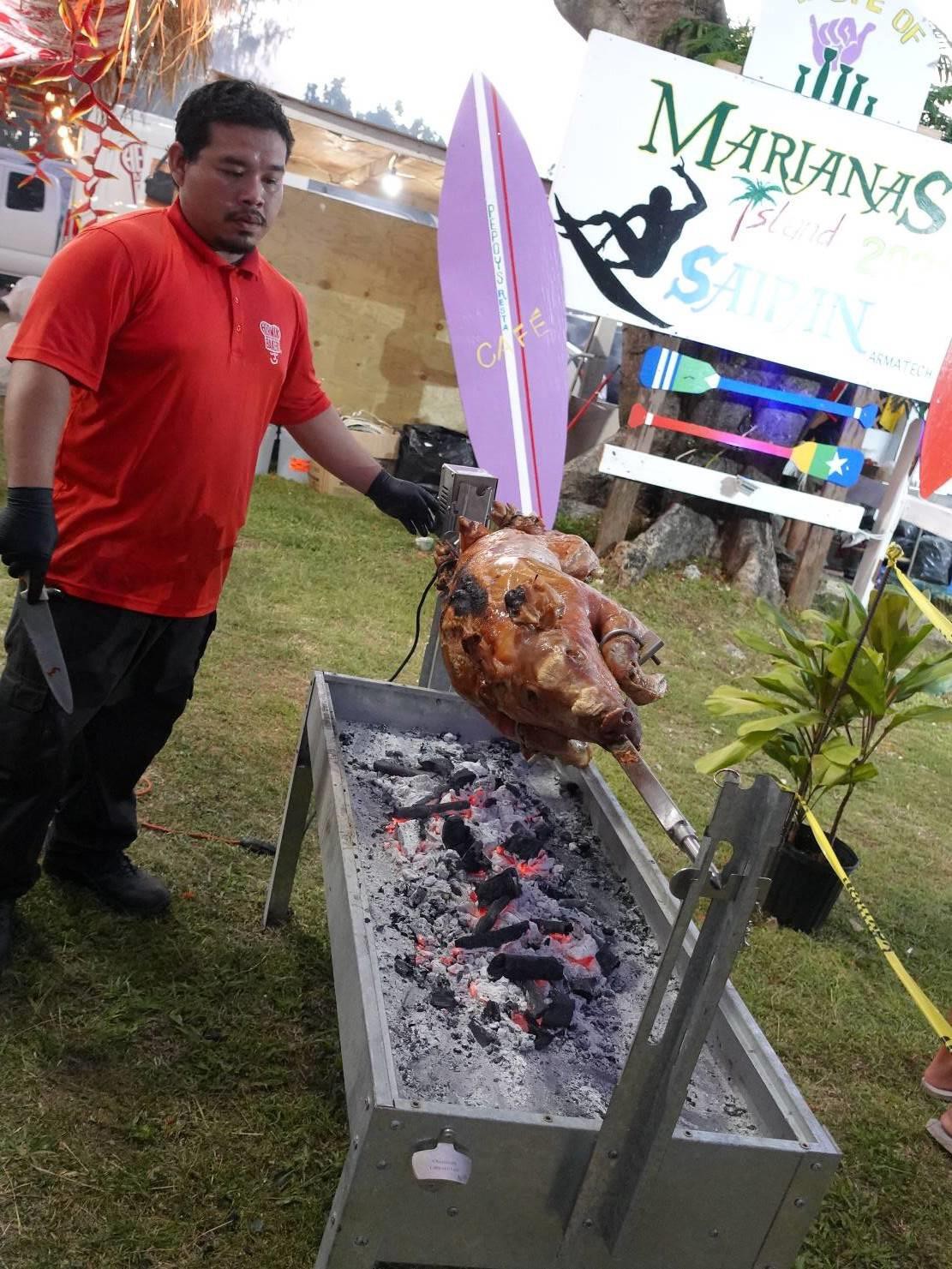 Herman’s Modern Bakery roasts a pig at the 23rd Annual Taste of the Marianas International Food Festival & Beer Garden on June 18, 2022 at Garapan Fishing Base.