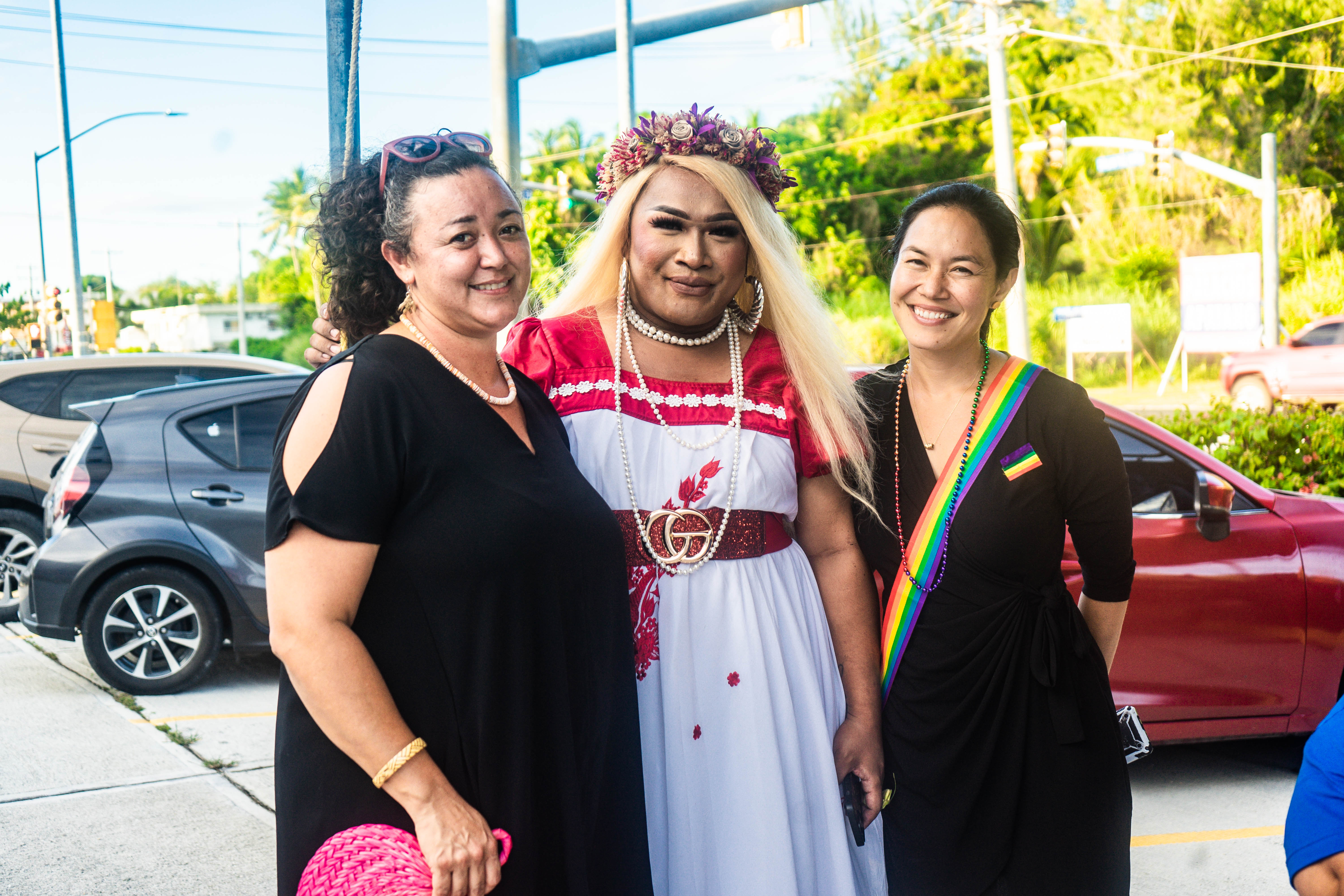 Reps. Leila Staffler and Tina Sablan with Nathan Glamz.