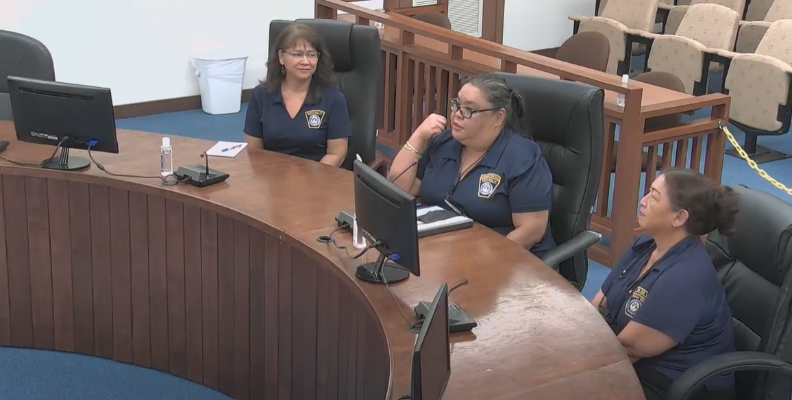 Department of Public Safety Administrative Director Kaye Inos, center, appears before the House Ways and Means Committee with DPS Human Resources Manager Esther Delos Reyes, left, and Bureau of Motor Vehicles Director Juana Leon Guerrero on Tuesday in the House chamber.