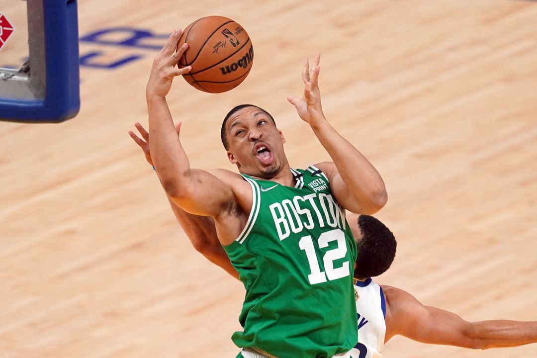 Boston Celtics forward Grant Williams (12) shoots against Golden State Warriors guard Stephen Curry (30) in the second half during game two of the 2022 NBA Finals at Chase Center in San Francisco, California on June 5, 2022.