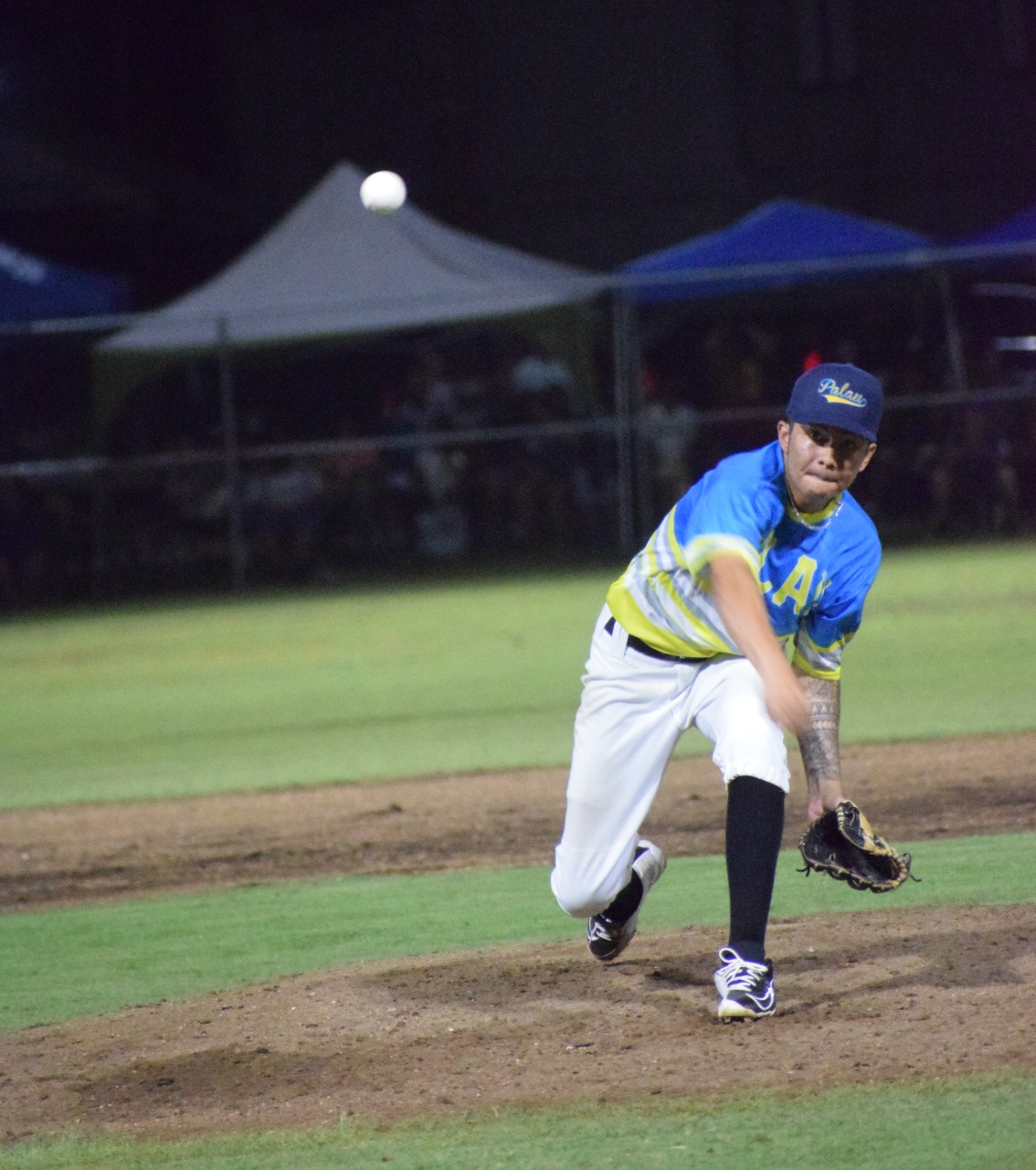Palau's Ashton Kinto pitches against the NMI during the game Saturday at the Tan Ko Palacios baseball field.