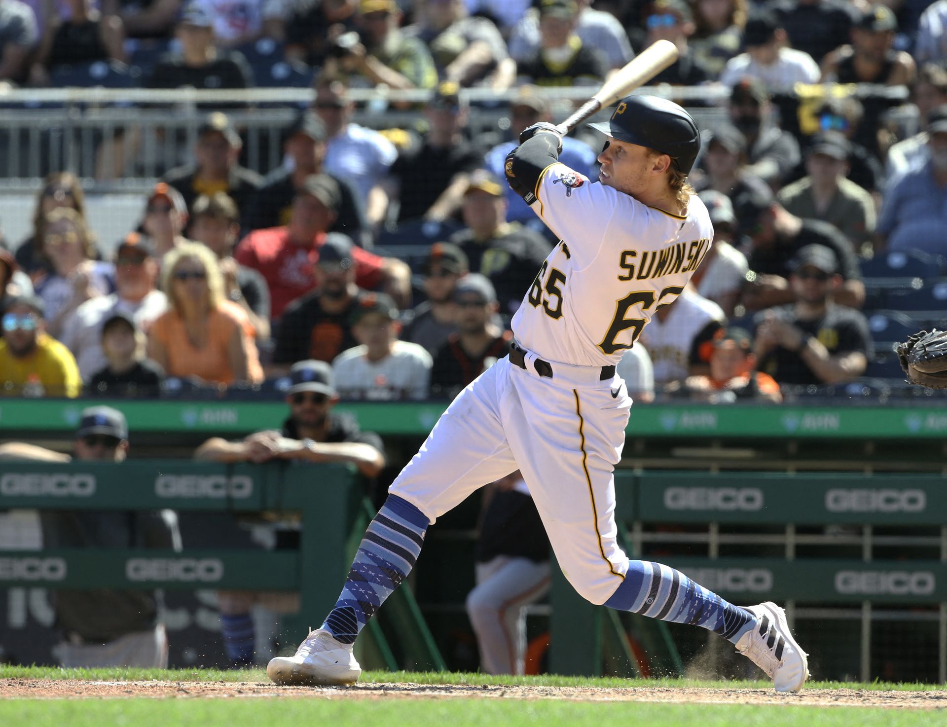 Pittsburgh Pirates right fielder Jack Suwinski (65) hits his third solo home run of the game which was a walk off game winner in the ninth inning against the San Francisco Giants at PNC Park in Pittsburgh, Pennsylvania on June 19, 2022.