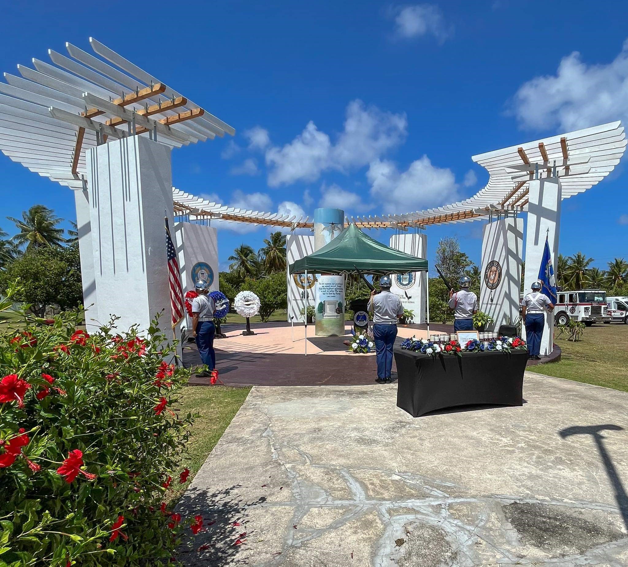 Members of the Tinian JROTC Stallion Battalion Color Guard post the colors.