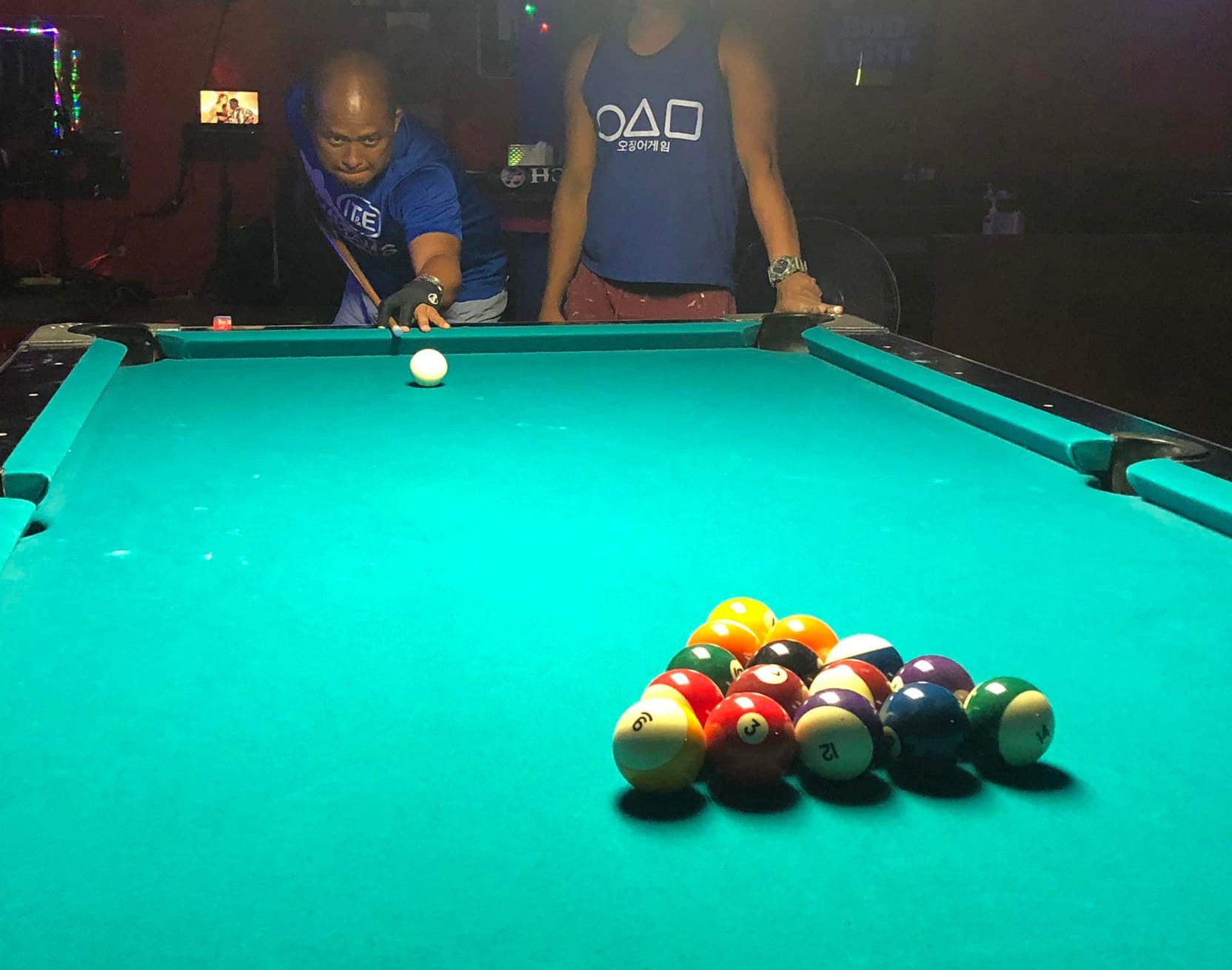 Rolly Villanueva of the VFW IT&E Destroyers lines up for the break in a Tuesday Division game of the SBA Budweiser Open 8-Ball at  9-Eleven Restobar.