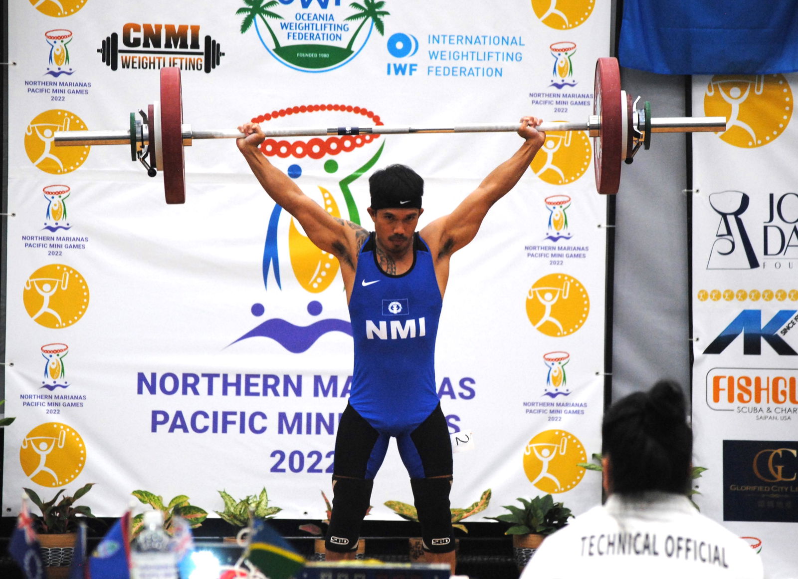 The NMI's Ray Santos successfully lifts 92kg in the snatch portion during the weightlifting event of the 2022 Pacific Mini Games on Monday at the MHS gym. 