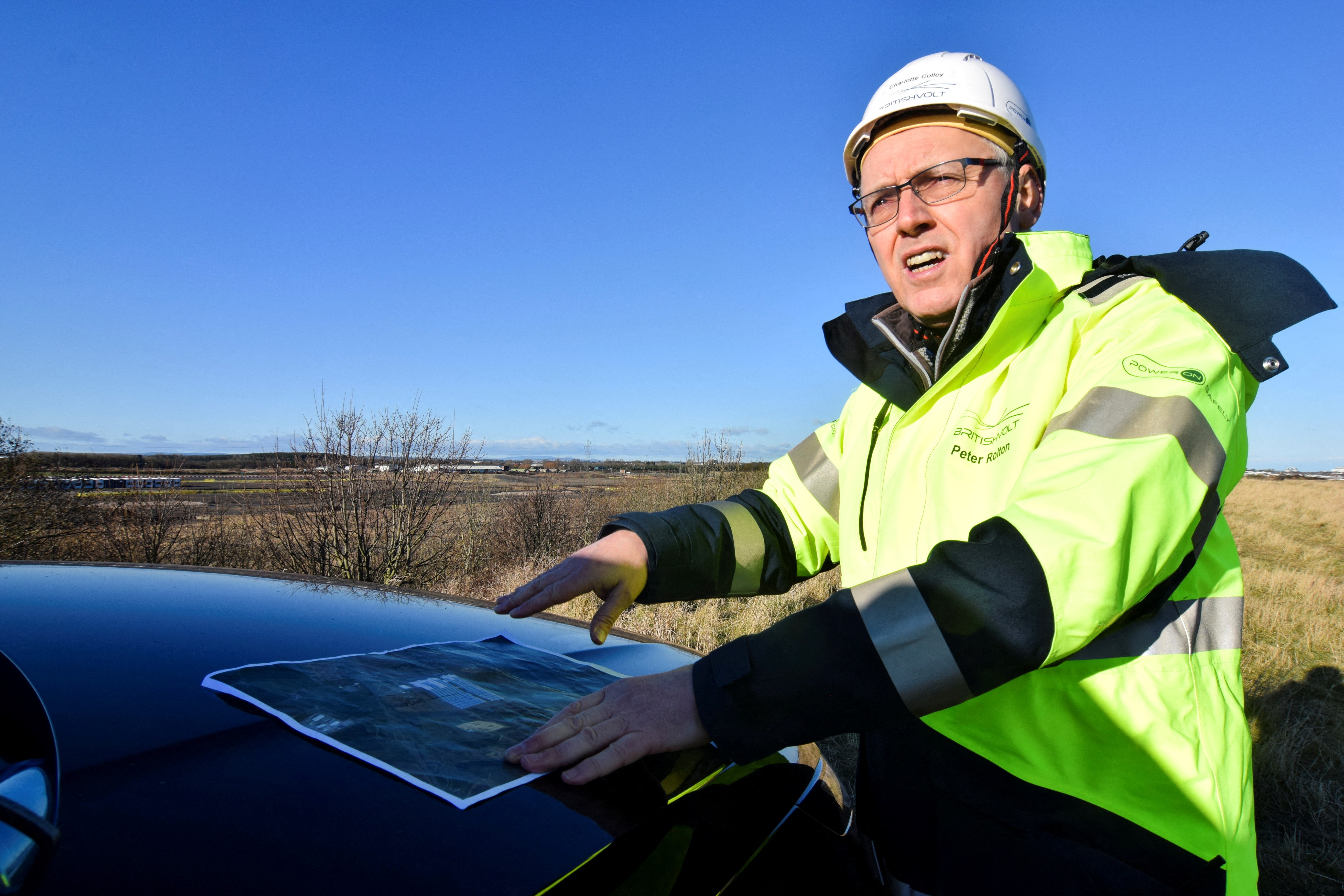 Peter Rolton, executive chairman of electric vehicle battery startup Britishvolt, gestures at the site of the company's large planned battery plant, in the northern English former industrial town of Blyth, Britain on Jan. 27, 2022.