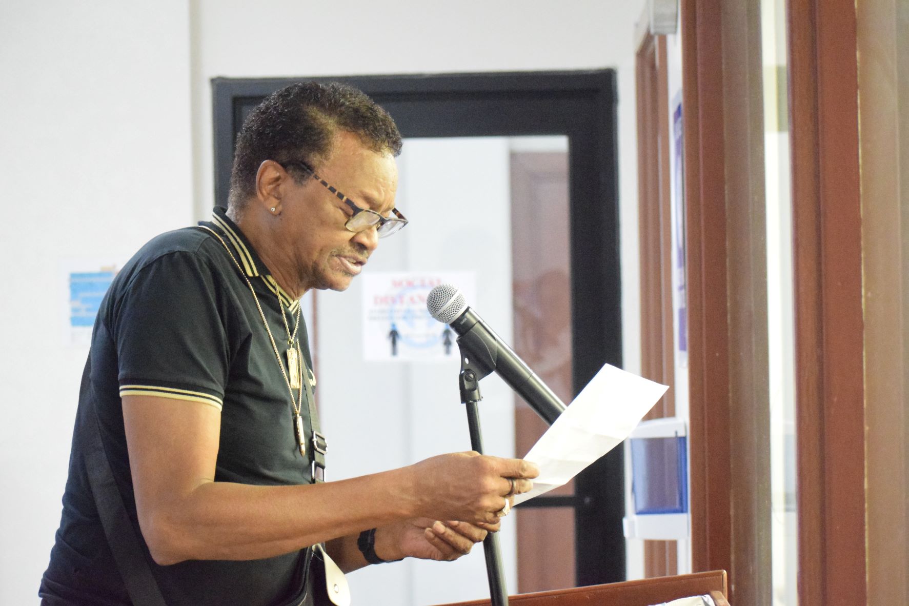 Retired teacher Ambrose Bennett speaks during a public comment portion of a House session in March.