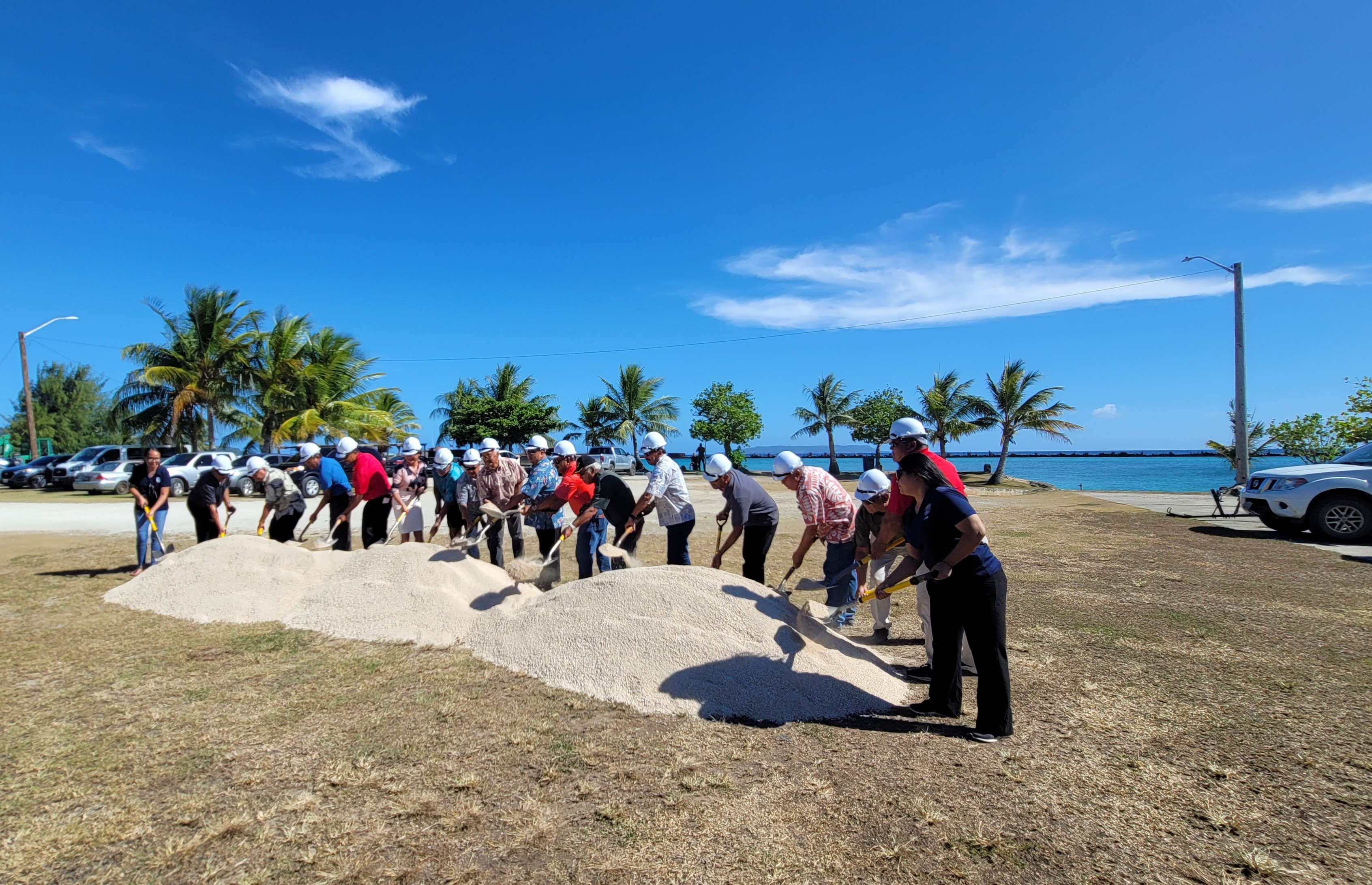 Gov. Ralph DLG Torres, center, joins Tinian Mayor Edwin Aldan, Commonwealth Ports Authority board and staff, and Tinian Legislative Delegation members in throwing ceremonial shovelfuls of sand to mark the beginning of the Tinian Marina Beautification Project at Tinian Port on Friday.
