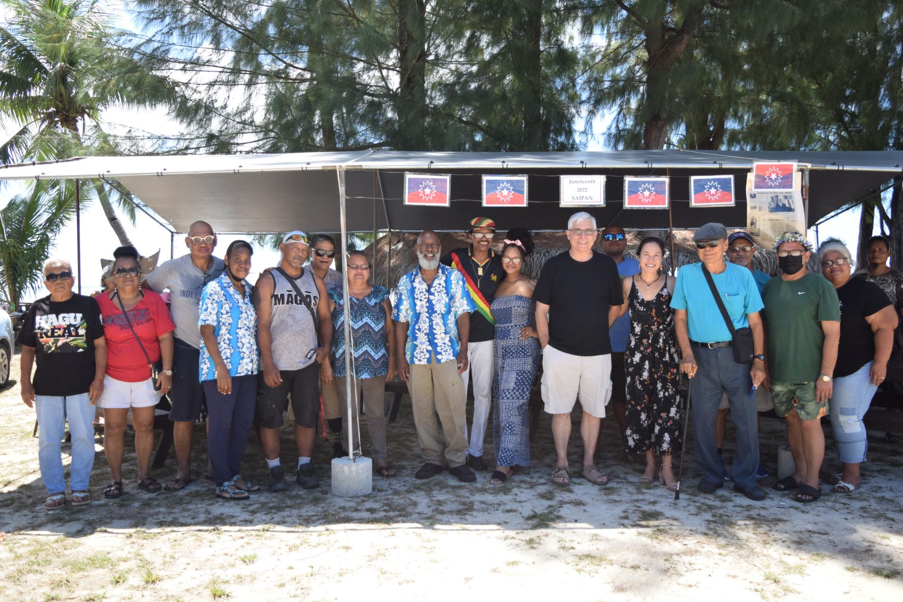 Members of the African American community on Saipan pose with Rep. Tina Sablan and other local residents during the Juneteenth celebration on Sunday, at the Civic Center beach in Susupe.