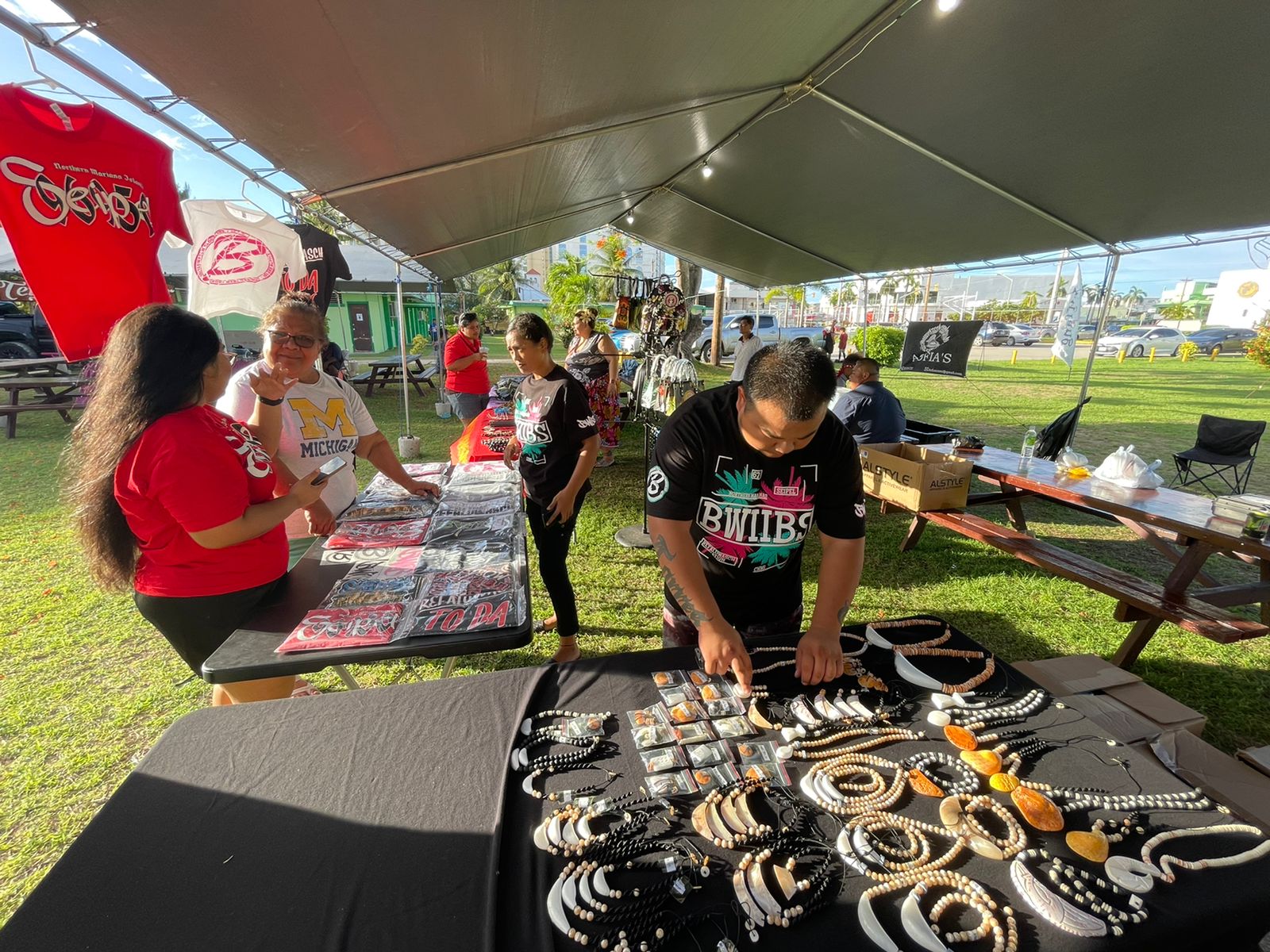Bwiibs, a local vendor, offers island-style t-shirts at Project Liffang in Garapan during the 2022 Pacific Mini Games.