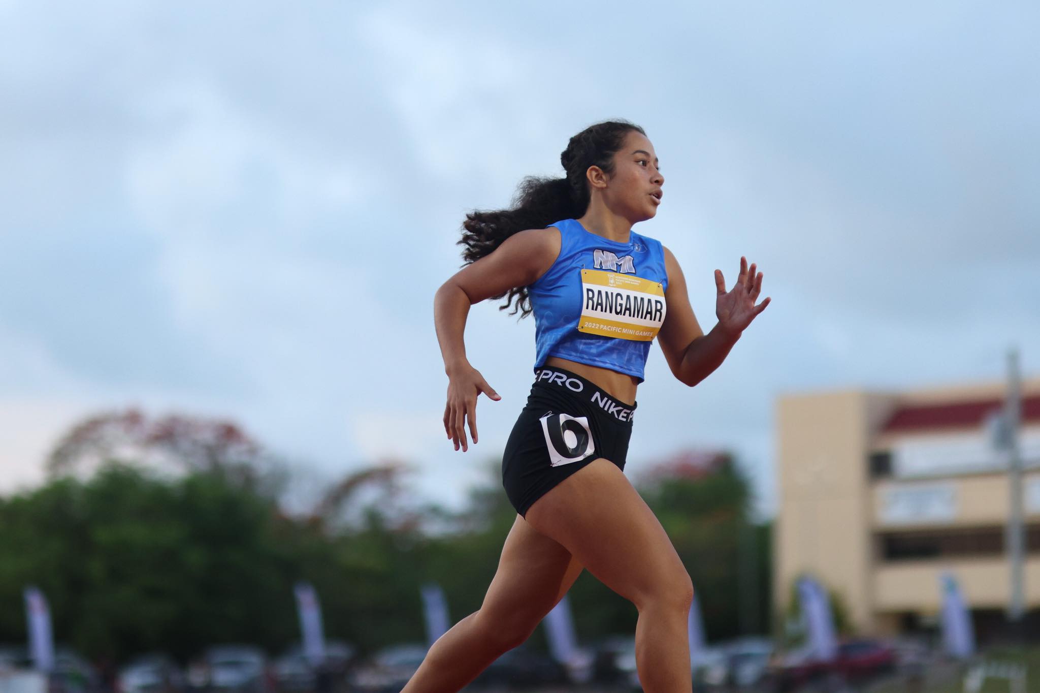 The NMI's Kina Rangamar paces herself during the women's 4x100 meter relay event in athletics at the Oleai Sports Complex.