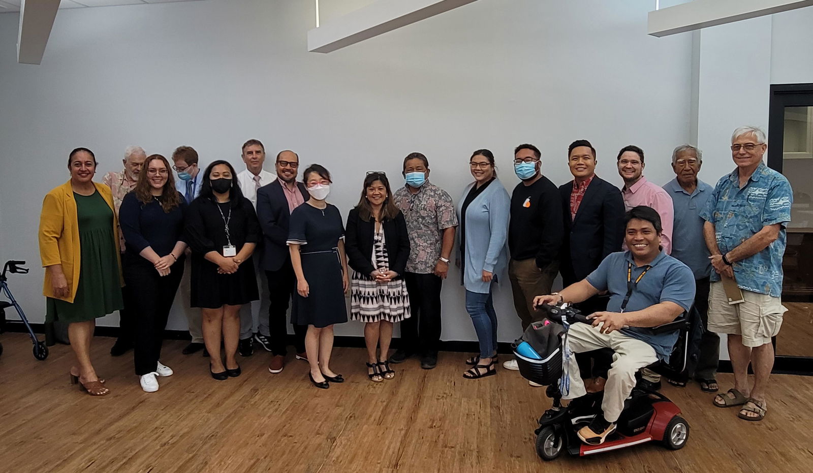 Law Professor Rose Cuison-Villazor, center, poses for a photo with community members, attorneys, pre-law students and judicial officials at the Guma Hustisia.