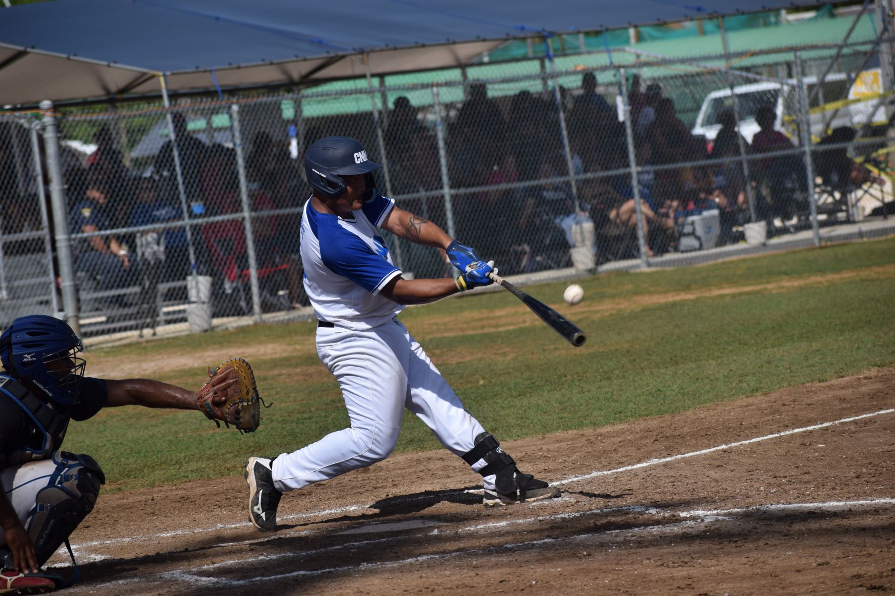 NMI first baseman Byron Kaipat hits the ball during the game against Fiji at the Francisco “Tan Ko” M. Palacios Baseball Field on Thursday.