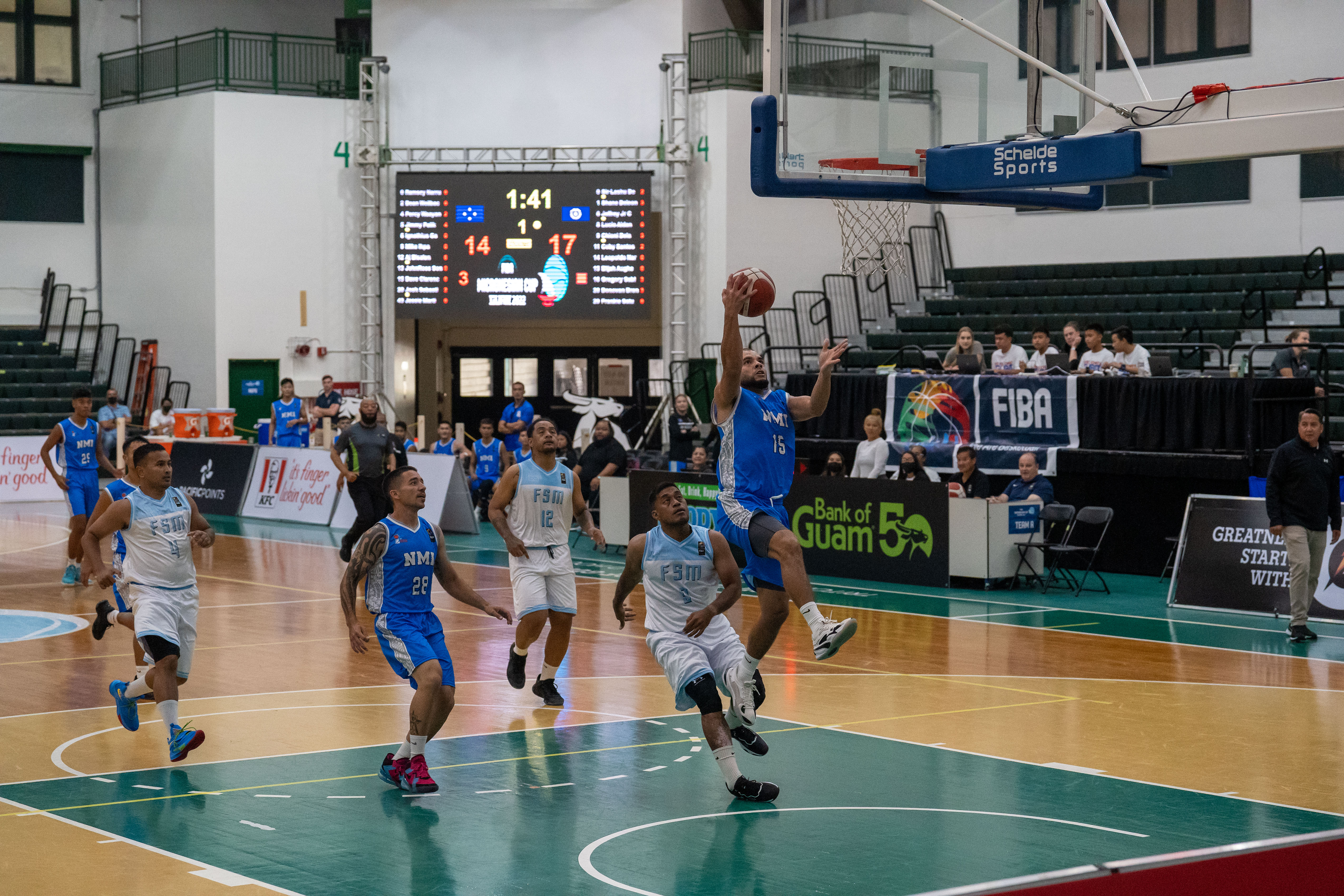 NMI Men's Derek Aughenbaugh extends for the finish.