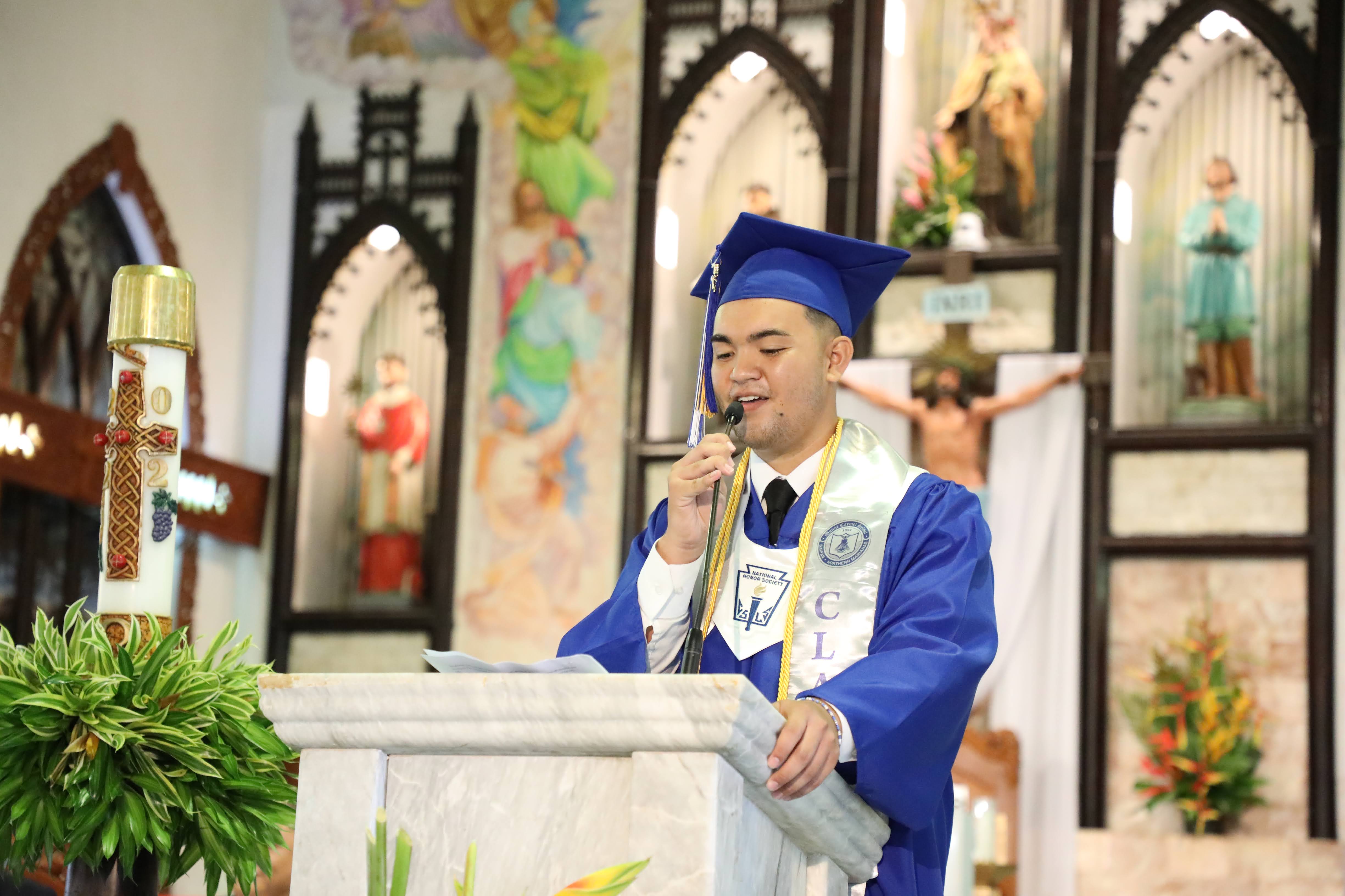 Mount Carmel School’s salutatorian Richard Jesus Mafnas Villagomez is awarded the Class of 1990 Scholarship during the school’s 2022 commencement ceremony on June 4, 2022.