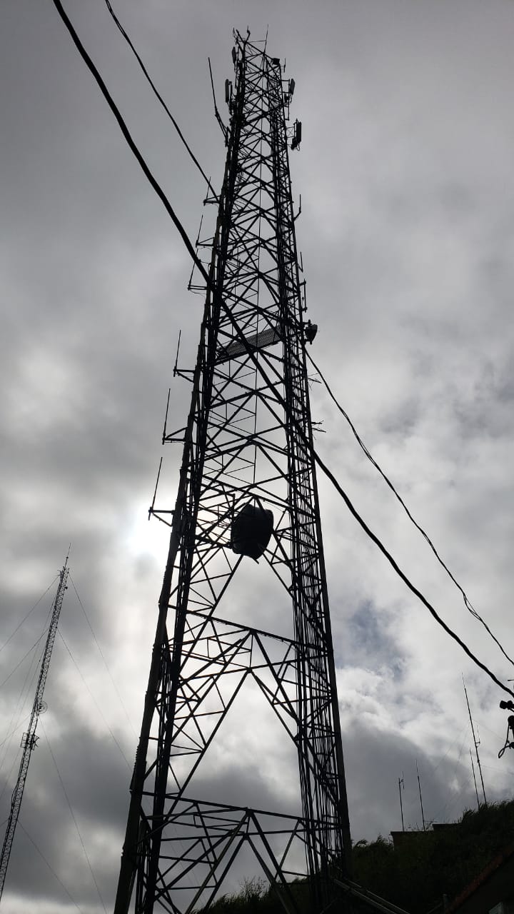 This Homeland Security and Emergency Management communication tower on Mt. Tapochau inspection photo was taken by IRP inspector Reno Celis. IRP Engineering assisted in developing the scope of work for the tower, funded through the NMHC CDBG-DR Program.  The IRP Archaeology team completed the archaeological review required by the funding agency. The communications tower is over 27 years old and serves as the main communications platform for the CNMI. A 2015 inspection report revealed significant corrosion on the tower’s structural members and fasteners, and recommends the replacement of defective members to stabilize the main structure.