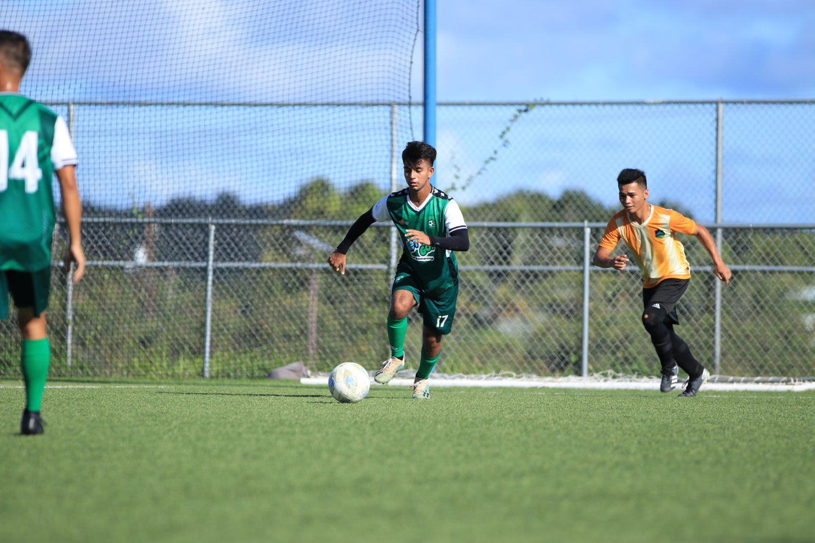 Tan Holdings FC's Rakib Hassan sets up the play after gaining possession during a Division A game of the Men's Marianas Soccer League at the NMI Soccer Training Center.