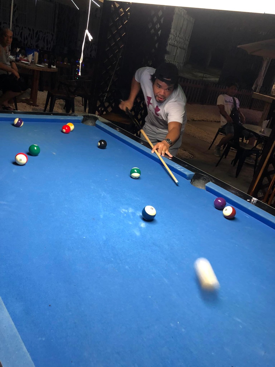 Ideals Sign JC Rustlers' Robert Sanciagco takes the shot during a Tuesday Division game of the SBA Budweiser Open 8-Ball League at Saipan Vegas’s New Bamboo Bar.