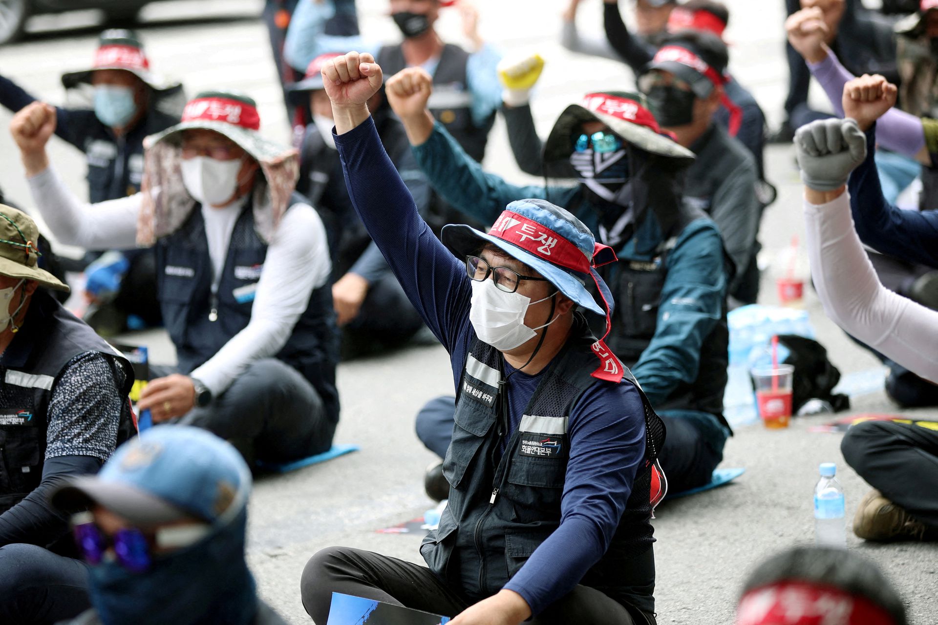 Members of the Cargo Truckers Solidarity union take part in a protest in front of Kia Motor's factory tin Gwangju, South Korea, June 10, 2022.