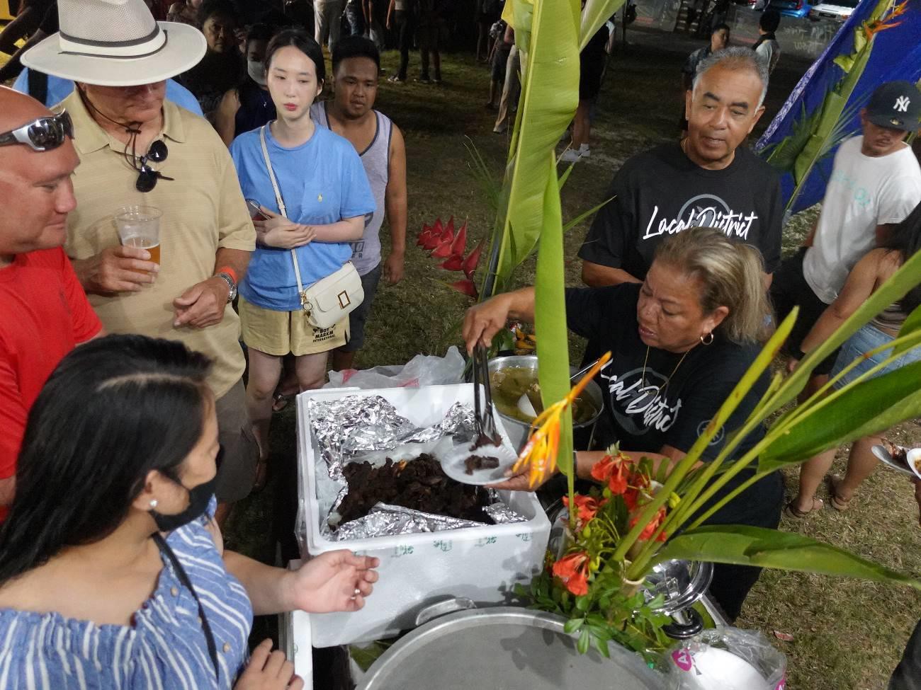 Samples of roasted pig and cow are served by the Tinian Mayor’s Office at the 23rd Annual Taste of the Marianas International Food Festival & Beer Garden on June 18, 2022 at Garapan Fishing Base.