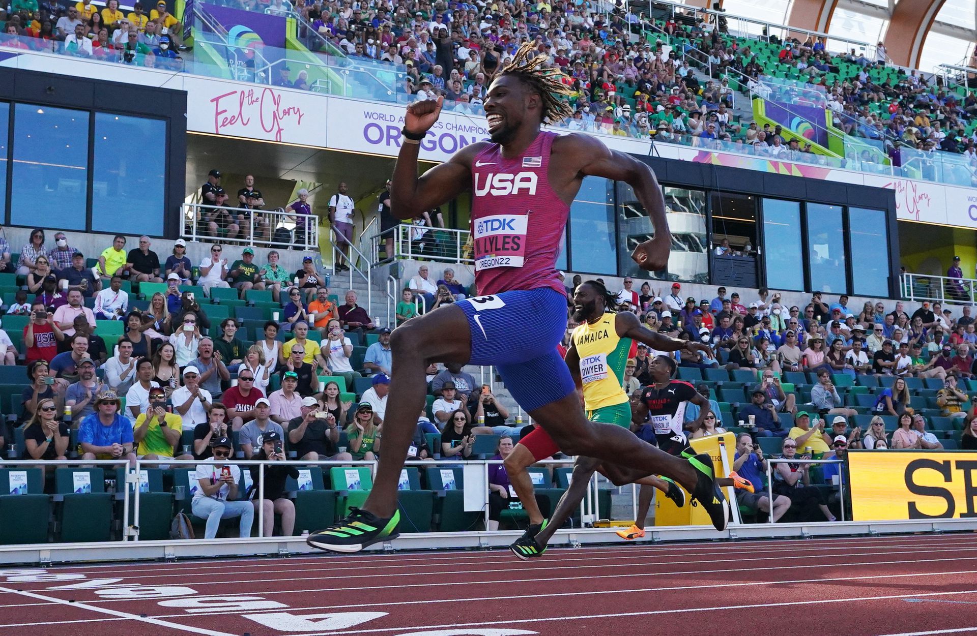 Noah Lyles of the U.S. crosses the line to win the heat ahead of second place Jamaica's Rasheed Dwyer  in the men's 200 meters event of the World Athletics Championships at Hayward Field in Eugene, Oregon, July 18, 2022