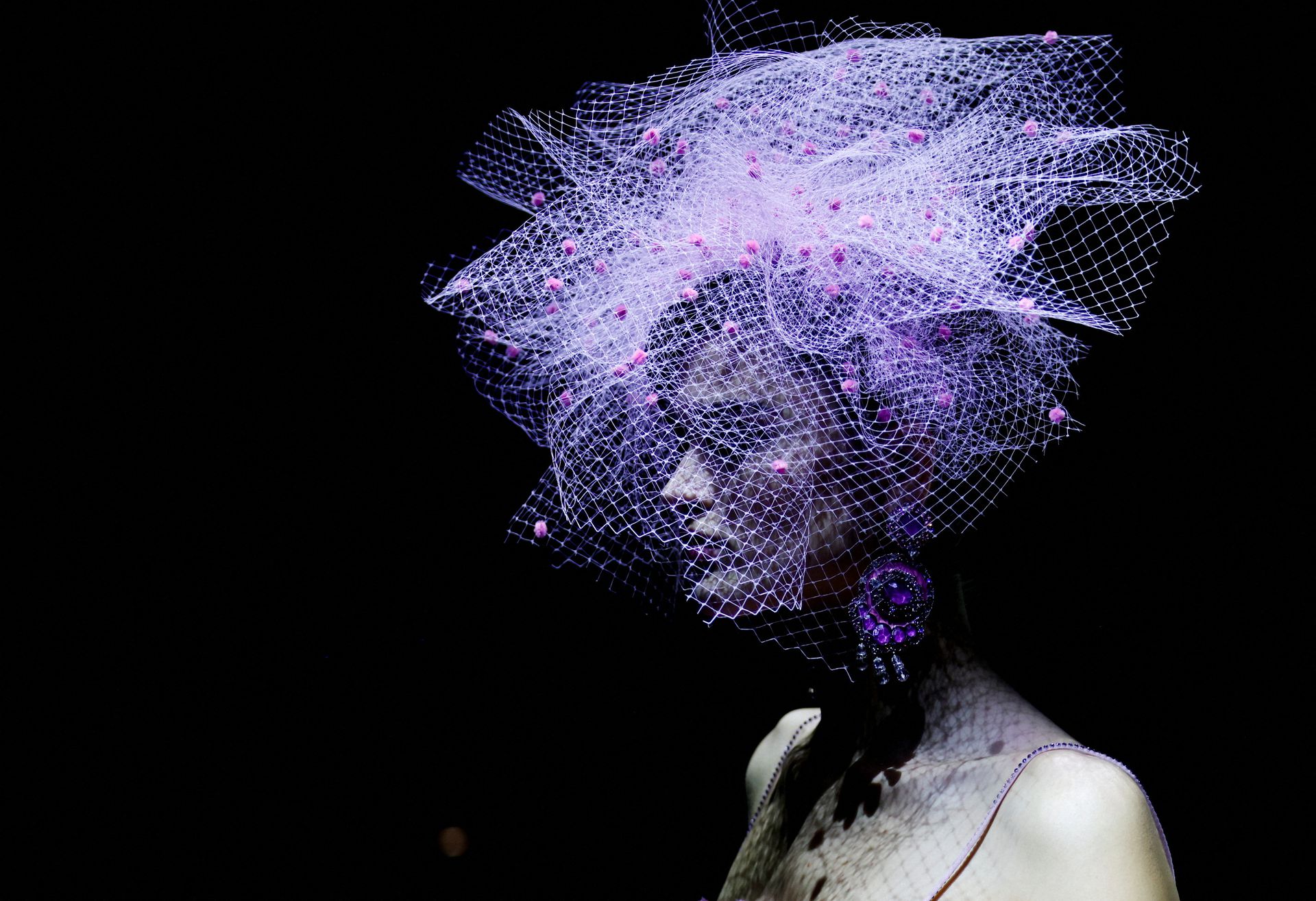 A model presents a creation by designer Giorgio Armani as part of his Haute Couture Fall/Winter 2022-2023 collection show for fashion house Giorgio Armani Prive in Paris, France, July 5, 2022.