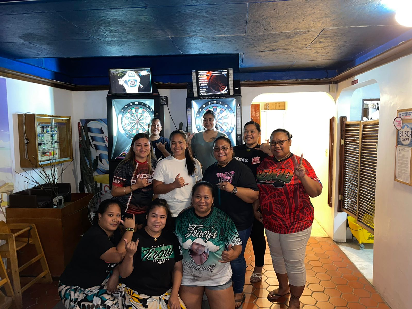 Oleai Tracy's Smokerz and 6JMS Vicious pose for a photo after their match Monday in the Ladies Division of the SEDA Bud Light Dart League at  Oleai Bar & Grill.