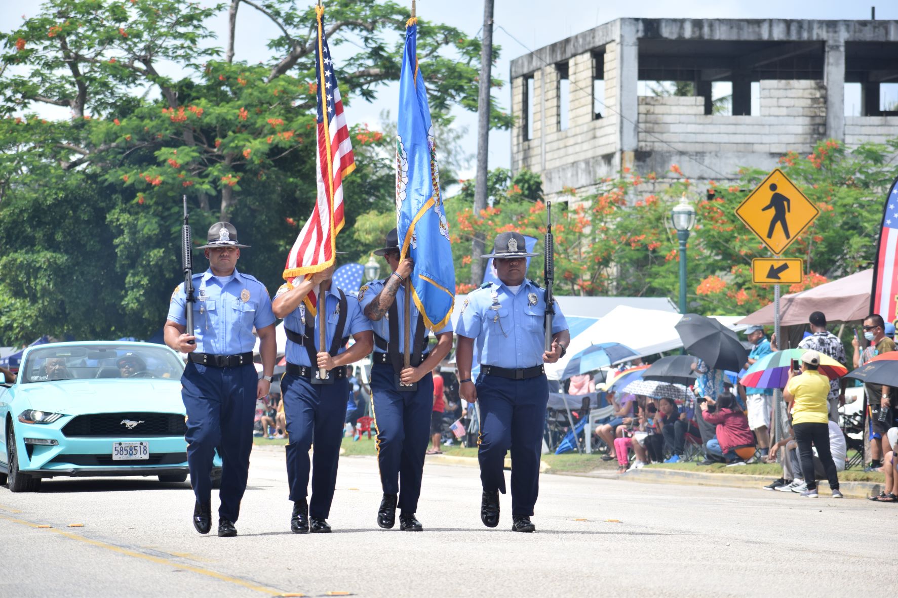 The honor guard marches on.