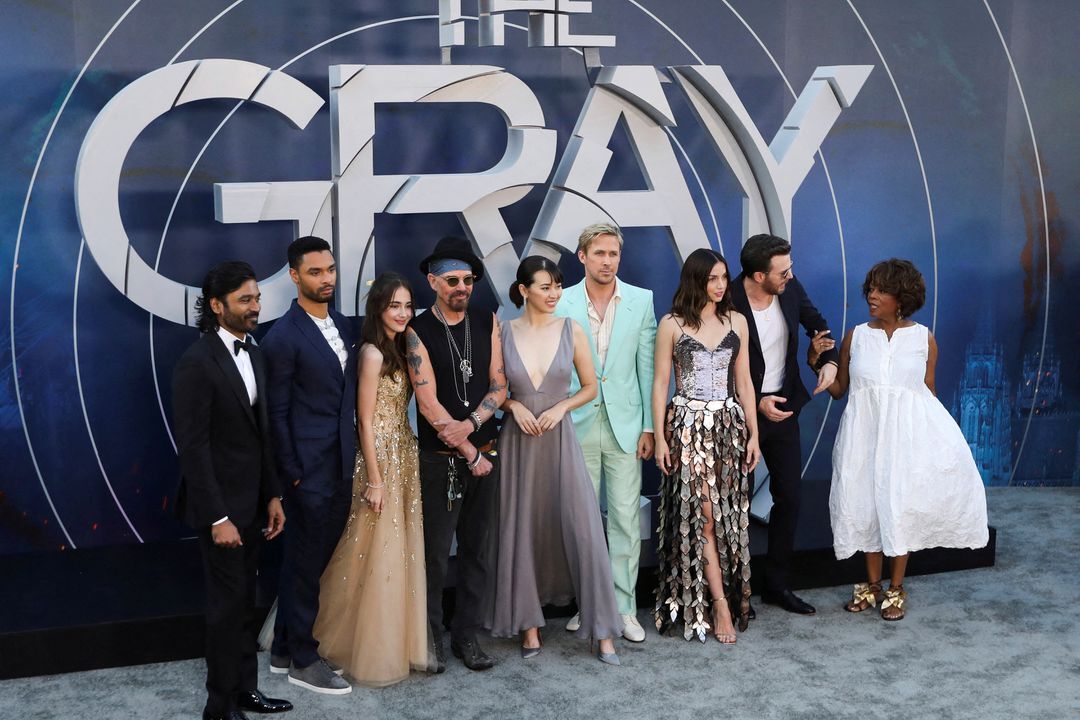 The cast poses on the red carpet before the World Premiere of Netflix's "The Gray Man" at TCL Chinese Theatre in Los Angeles, California, July 13, 2022.
