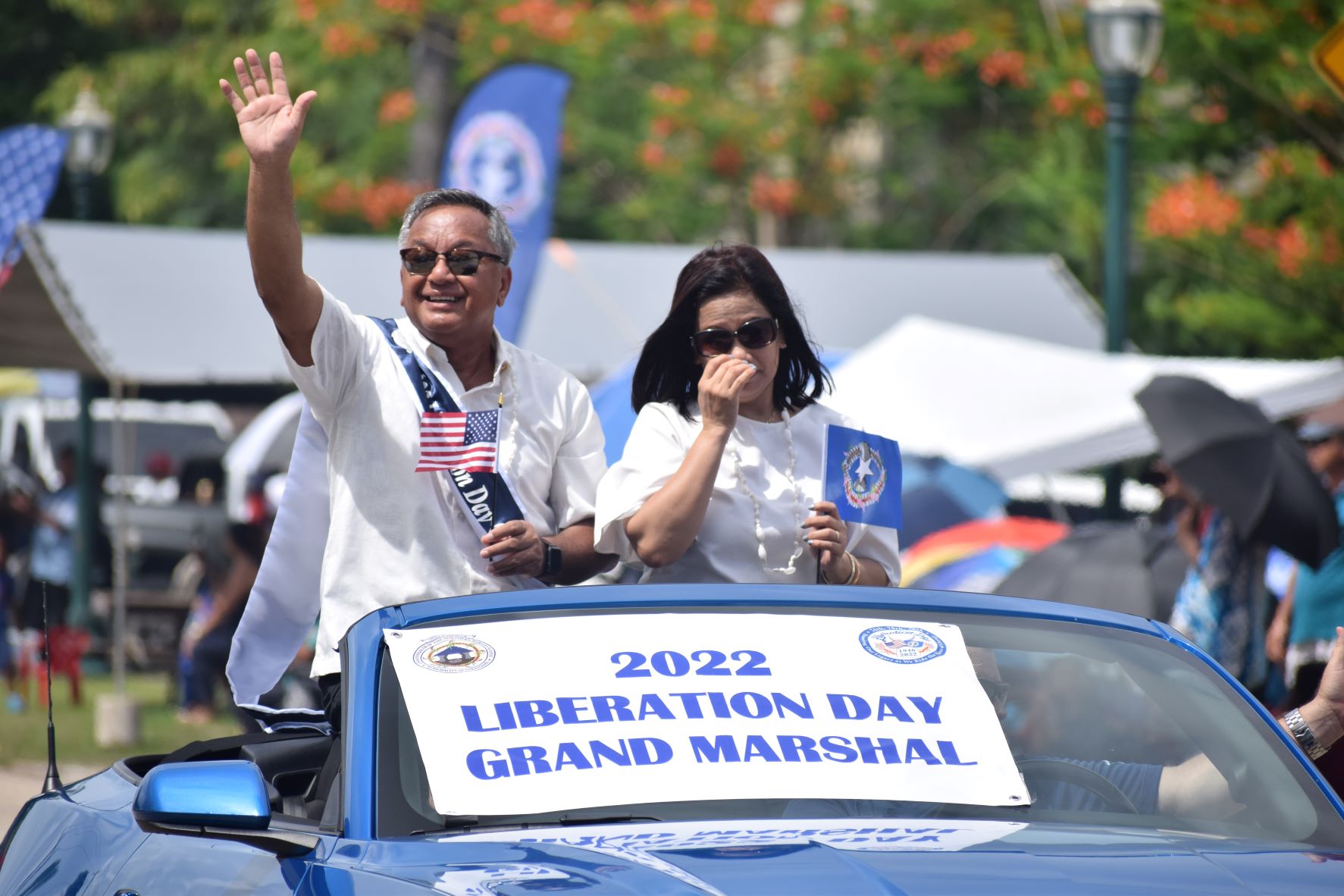 2022 Liberation Day parade grand marshal Mike Sablan with his wife.
