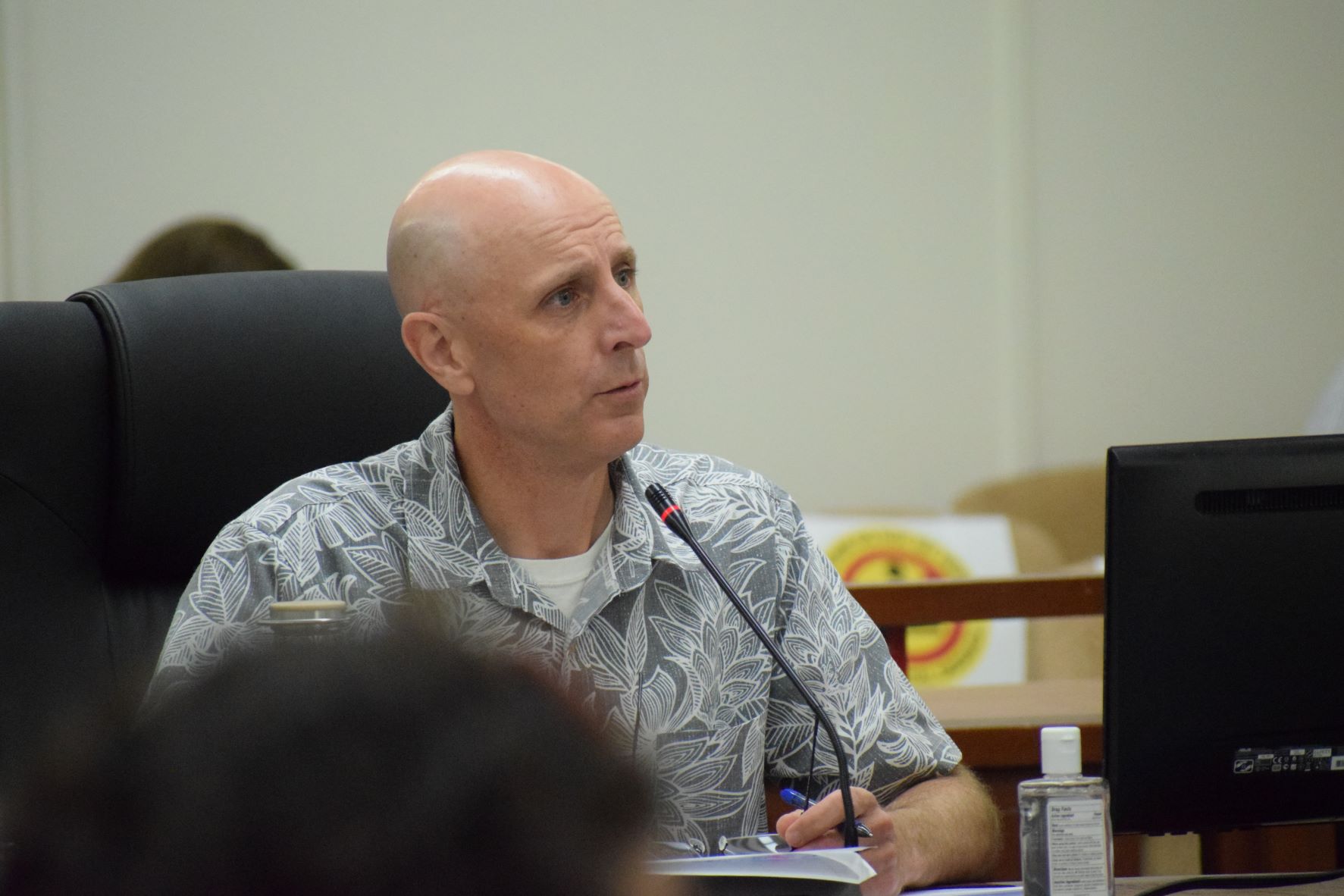 Commonwealth Utilities Corp. new deputy executive director, Chretien Voerg, answers a question during an “emergency” meeting of the House Committee on Public Utilities, Transportations and Communication in the House chamber on Tuesday.