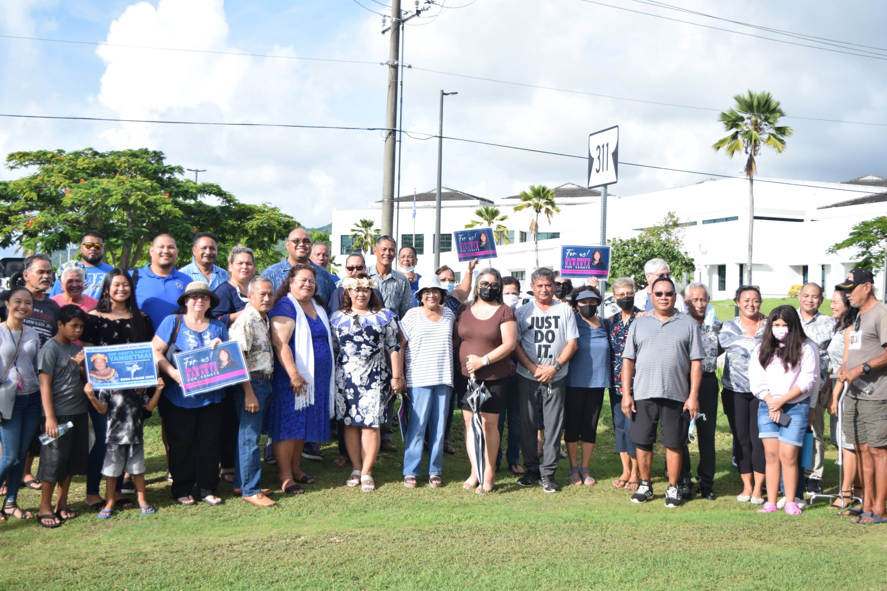 Reps. Denita Yangetmai and Celina Babauta pose for a photo with fellow Democrats after filing their candidacies at the Commonwealth Election Commission on Wednesday.