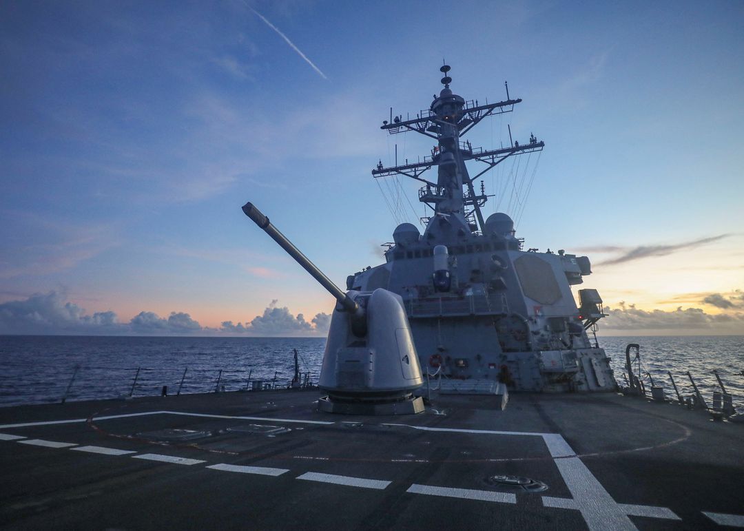 An Arleigh Burke-class guided-missile destroyer USS Benfold (DDG 65), forward-deployed to the U.S. 7th Fleet area of operations, conducts underway operations in the South China Sea, in this handout picture released on July 13, 2022.