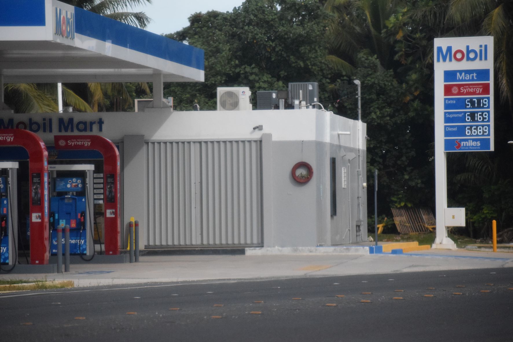 The Mobil Oil station in Chalan Kiya displays its new prices on Tuesday.