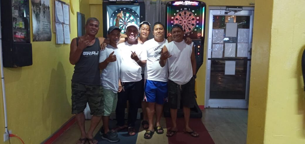 Tambayan D Tribal Slashers pose for a photo after  winning their match on Monday in the “A” Division of the SEDA Bud Light Dart League at the Tambayan Bar.
