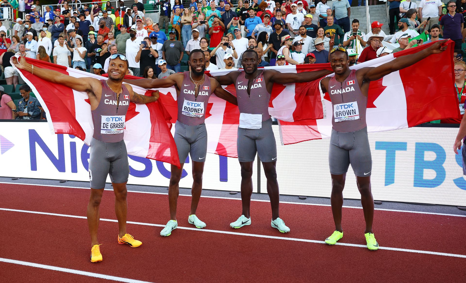 Canada's Andre De Grass, Canada's Aaron Brown, Canada's Jerome Blake and Canada's Brendon Rodney celebrate winning gold in the men's 4x100 meters relay final in the World Athletics Championships at Hayward Field in Eugene, Oregon, July 23, 2022.