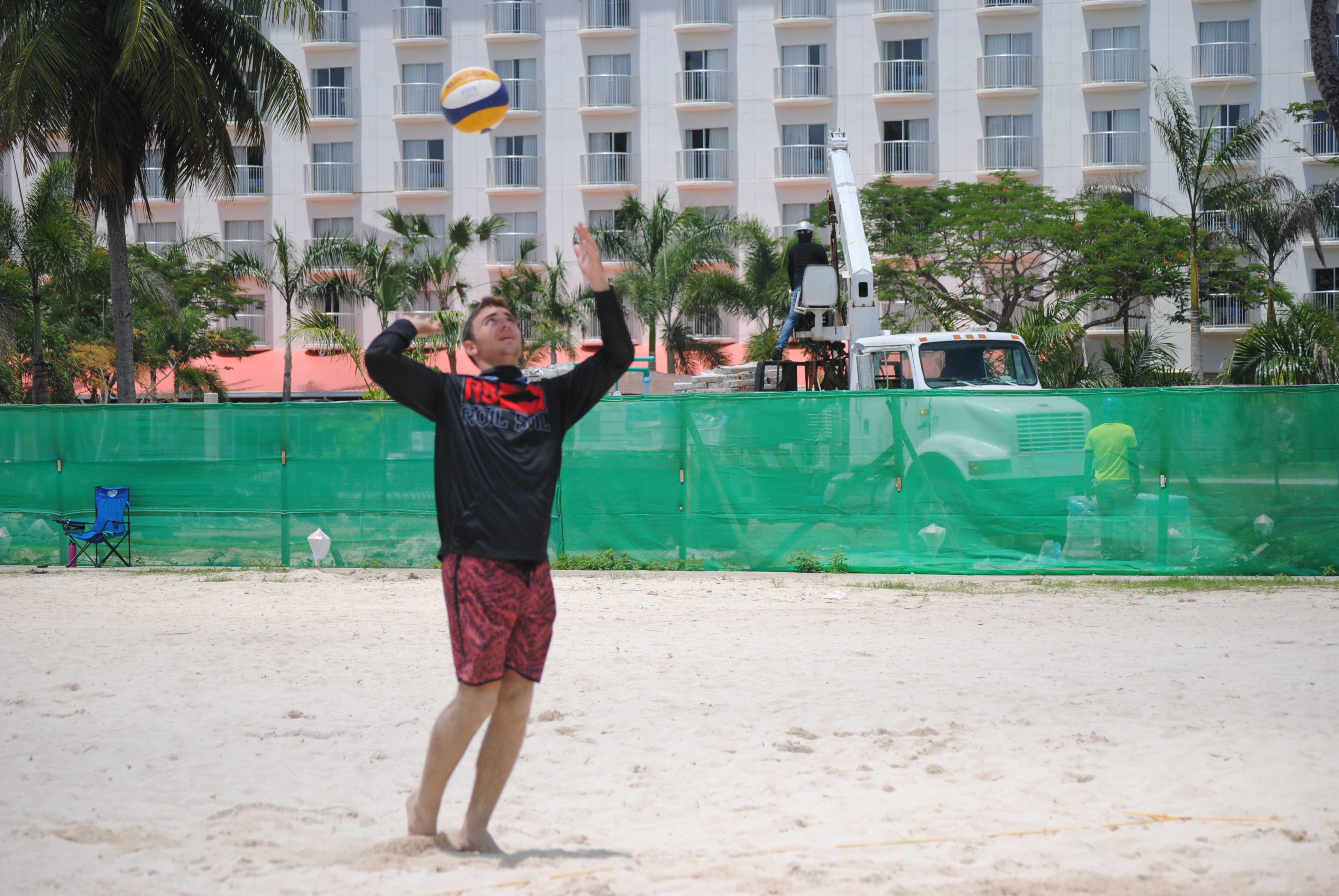 Colin Ramsey attempts the overhead serve.
