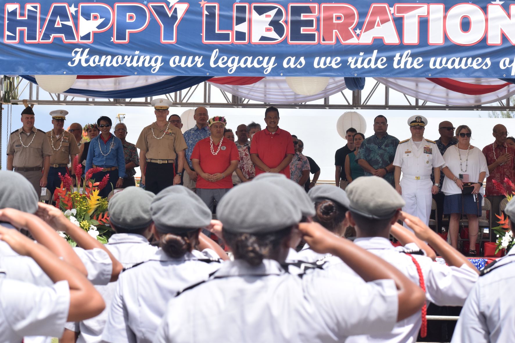 NMI Junior Reserve Officer Training Corps cadets salute the dignitaries.