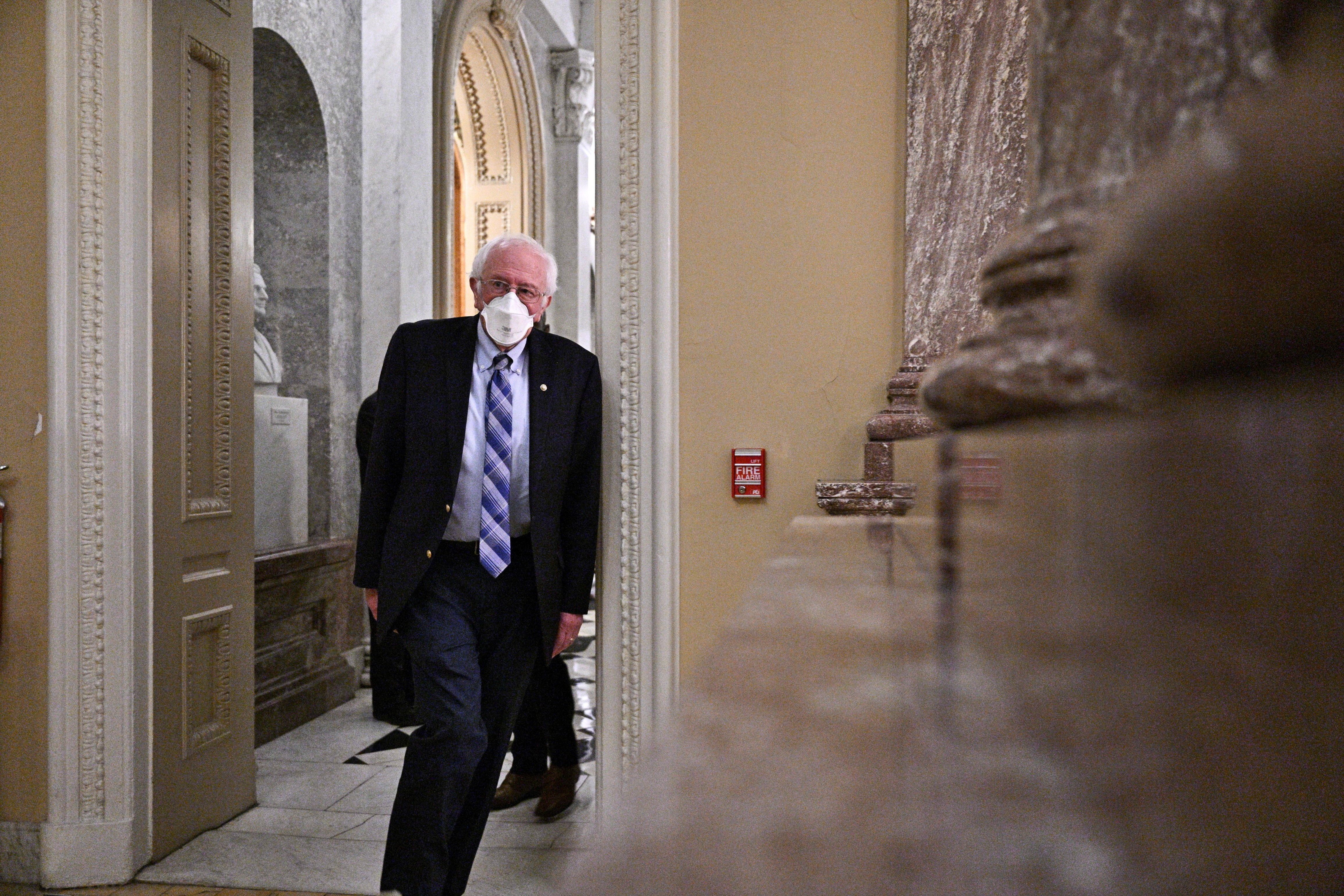 U.S. Sen. Bernie Sanders, I-Vt., leaves after voting on an amendment to the continuing resolution that averted a shutdown of the federal government, at the U.S. Capitol in Washington, D.C., Feb. 17, 2022.