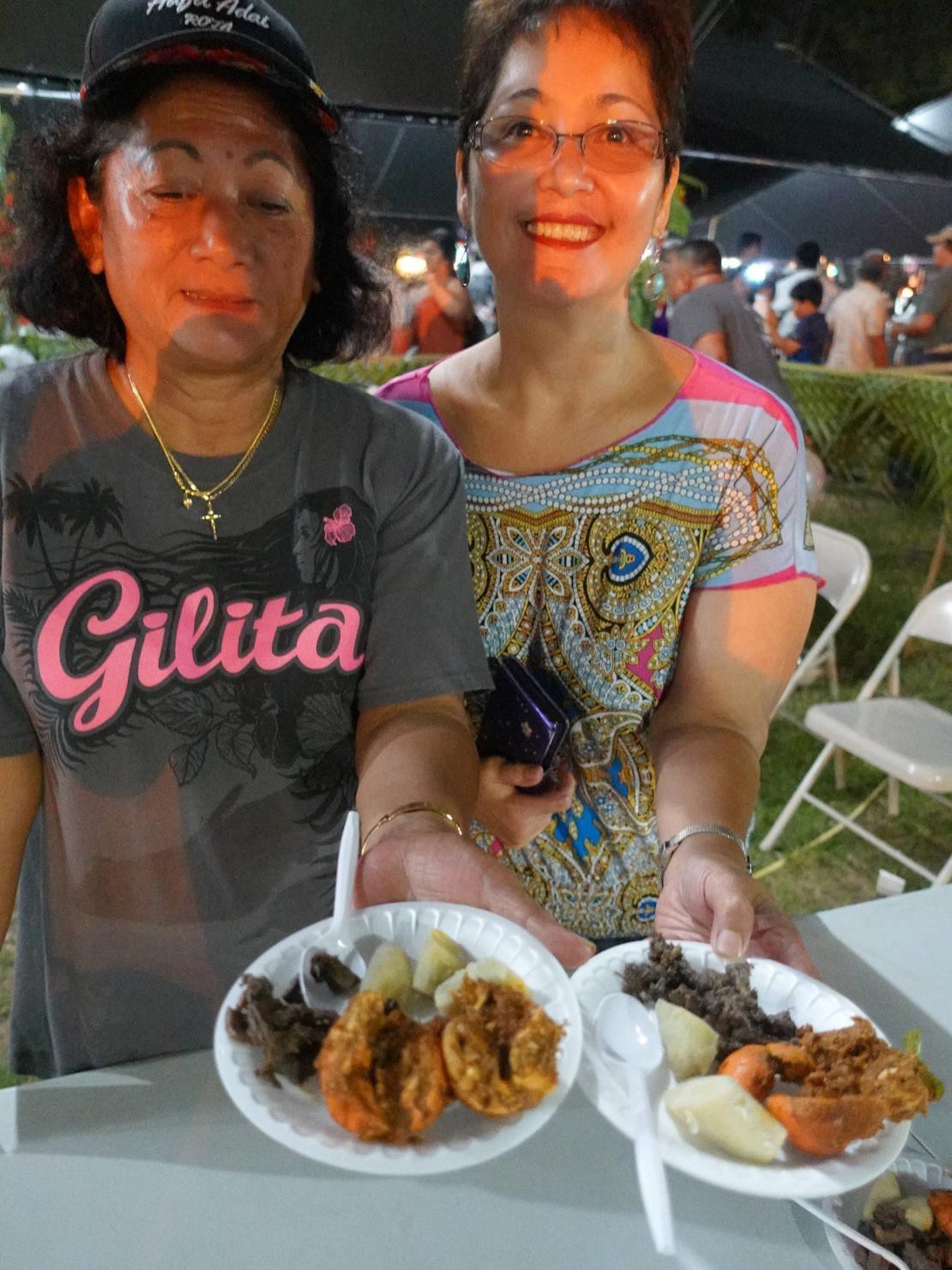 Representatives of the Rota Mayor’s Office offer free samples of sweet potato, hermit crab, and deer intestines on June 25, 2022, at the Taste of the Marianas International Food Festival & Beer Garden in Saipan.