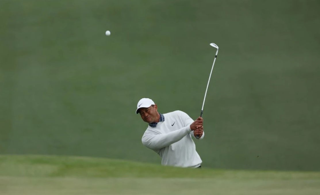 Tiger Woods of the U.S. chips onto the 7th green during the third round at the Augusta National Golf Club in Augusta, Georgia on April 9, 2022