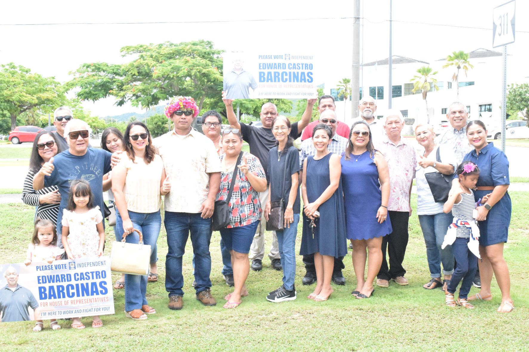 Military veteran and Rota independent House candidate Edward Castro Barcinas poses for a photo with his family and other supporters after filing his candidacy at the Commonwealth Election Commission on Thursday.