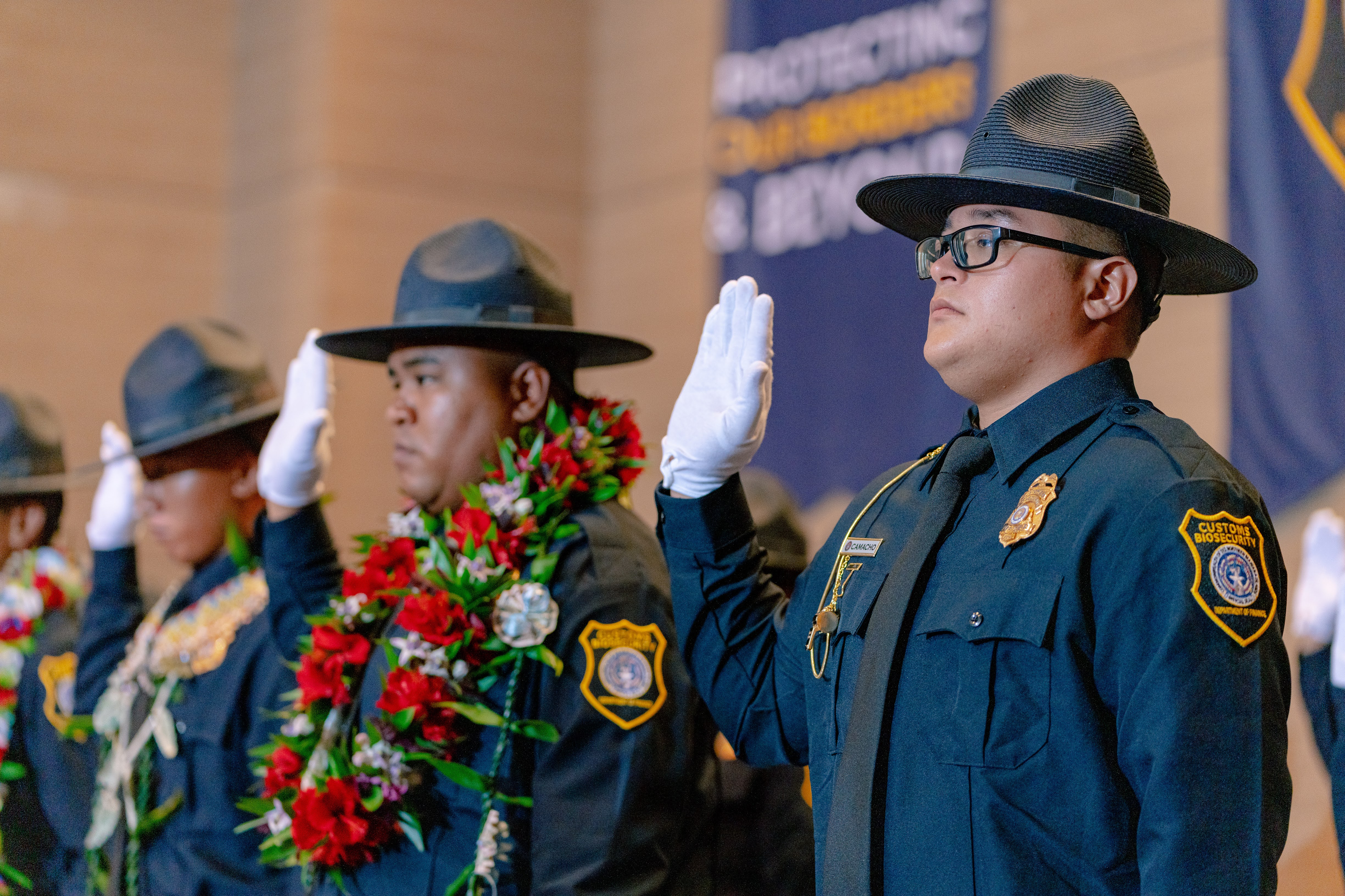 The graduates of the 9th Cycle Academy take their oath from CNMI Supreme Court Chief Justice Alexandro C. Castro.